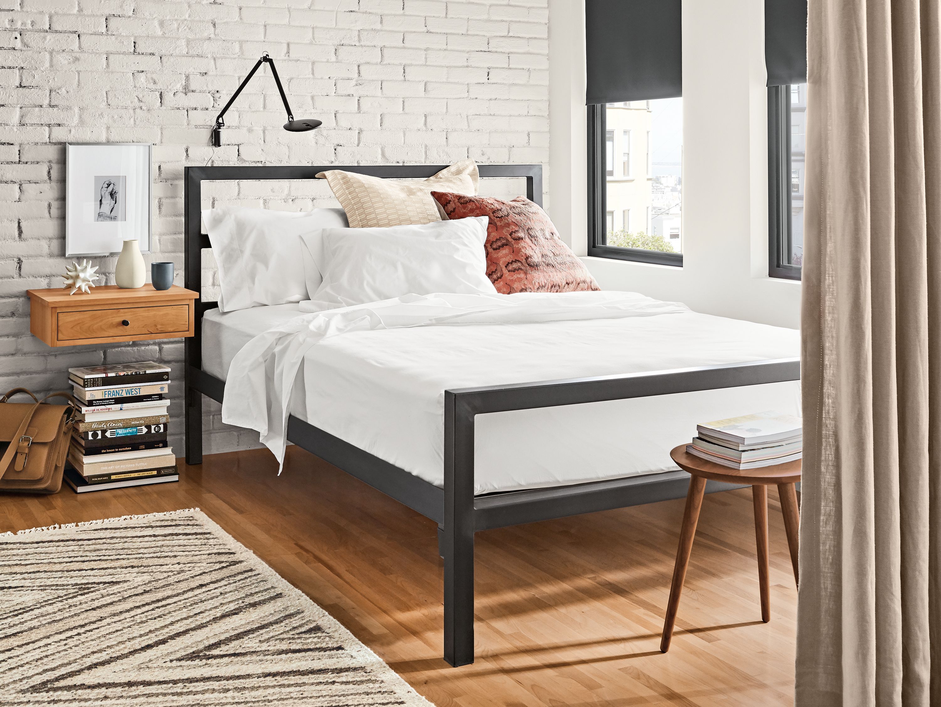 Detail of Parsons queen bed in natural steel.