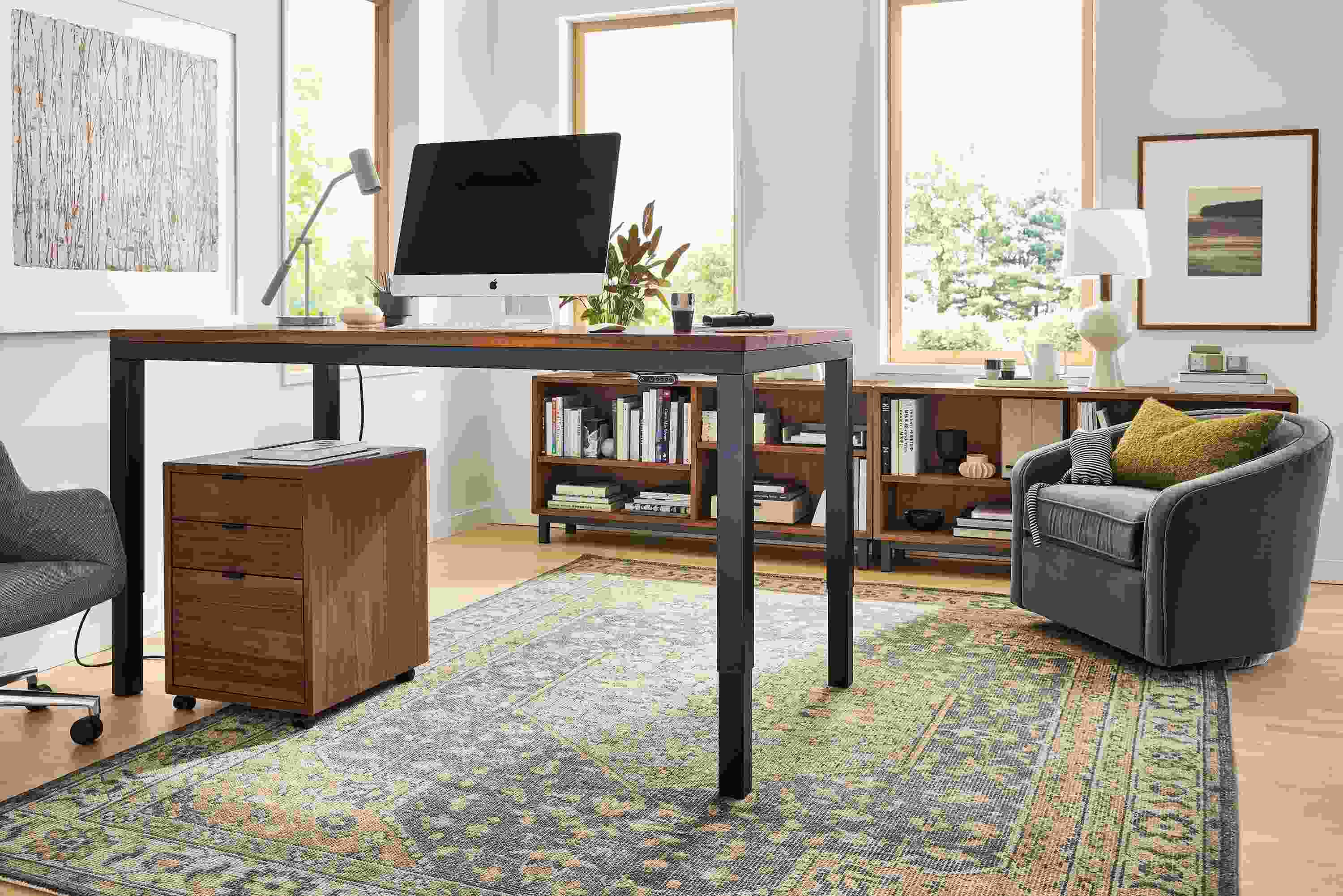Office with Parsons Adjustable height standing desk in graphite and walnut in raised position and Veda rug in Smoke.
