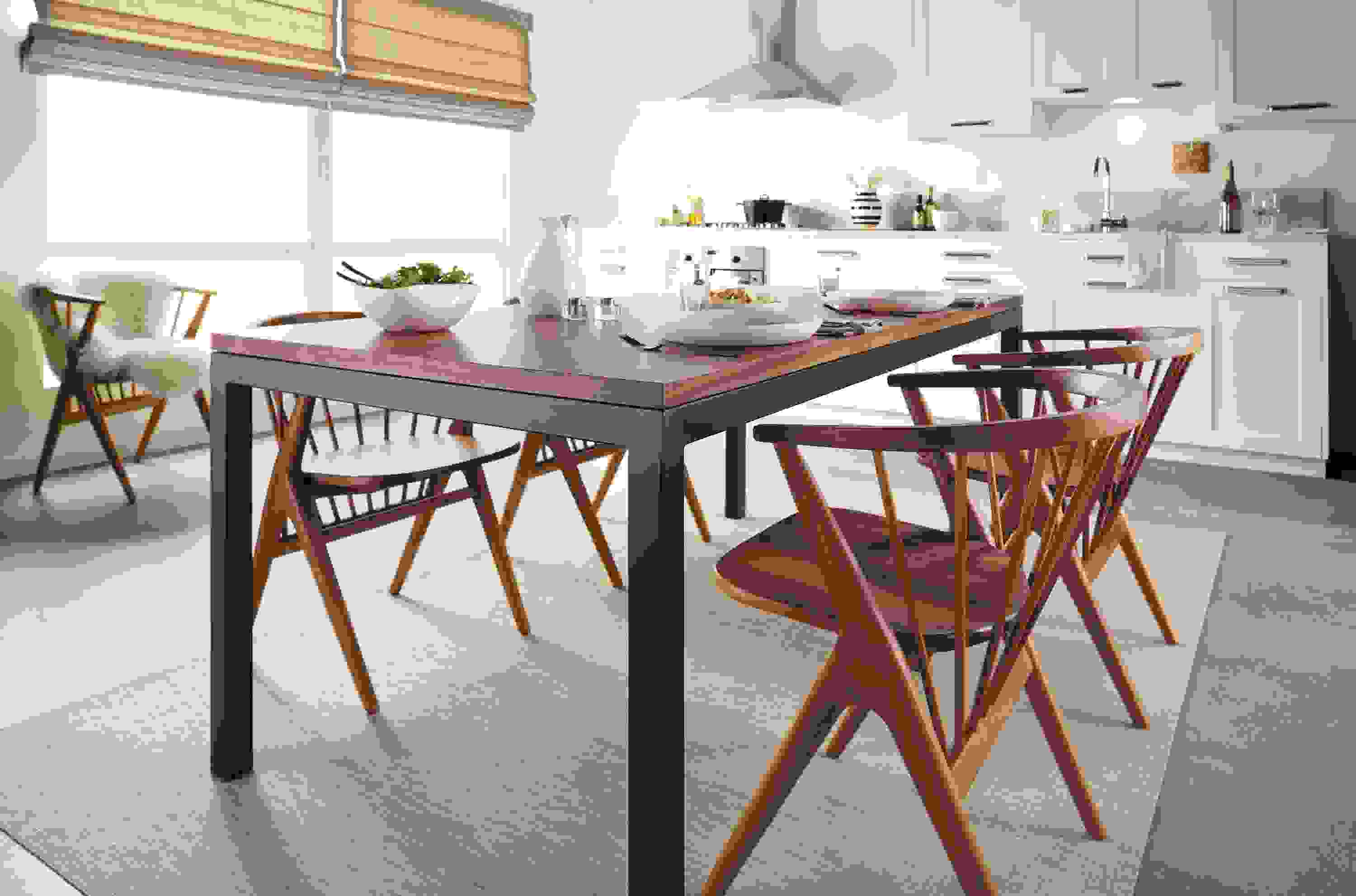 Detail of Parsons steel and wood table with Soren chairs.