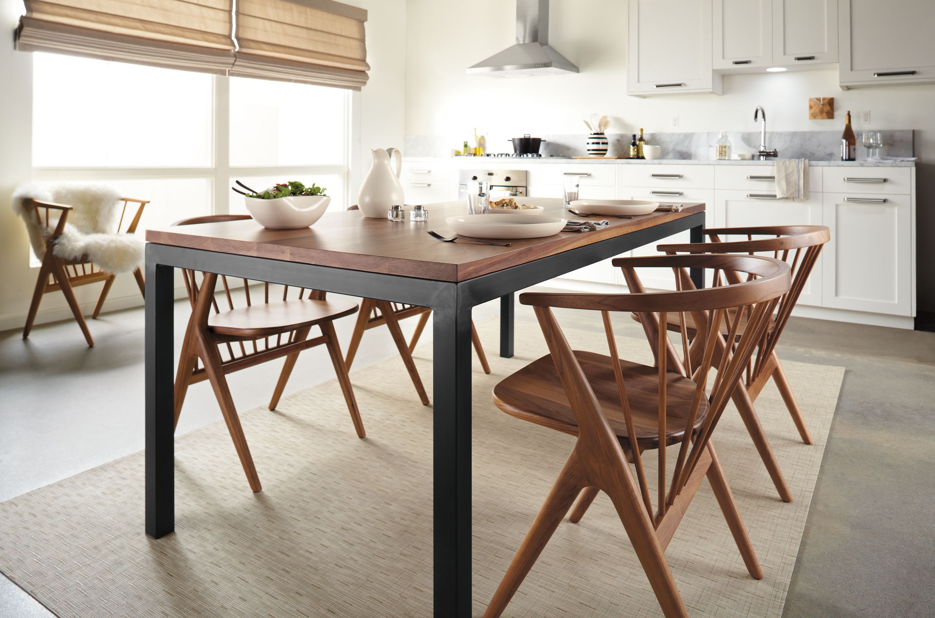 Detail of Parsons steel and wood table with Soren chairs.