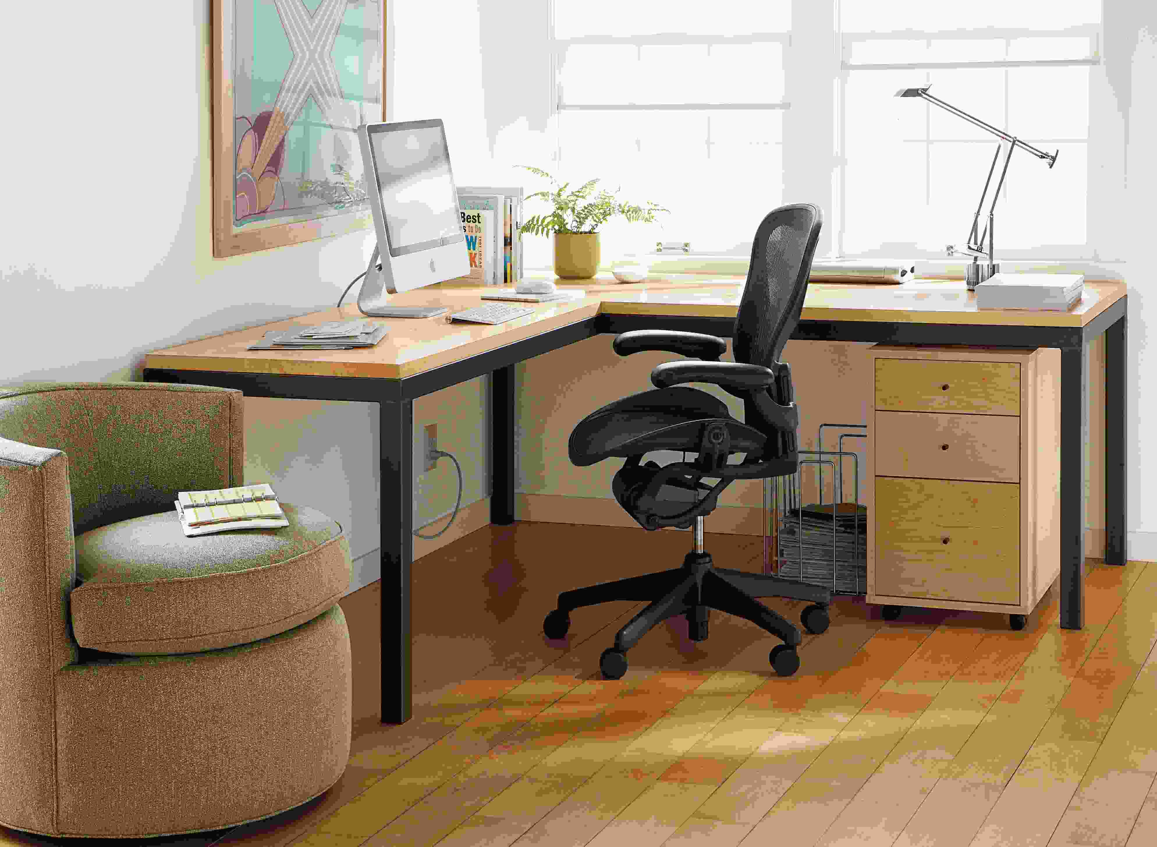 Parsons L-shaped desk with maple top.