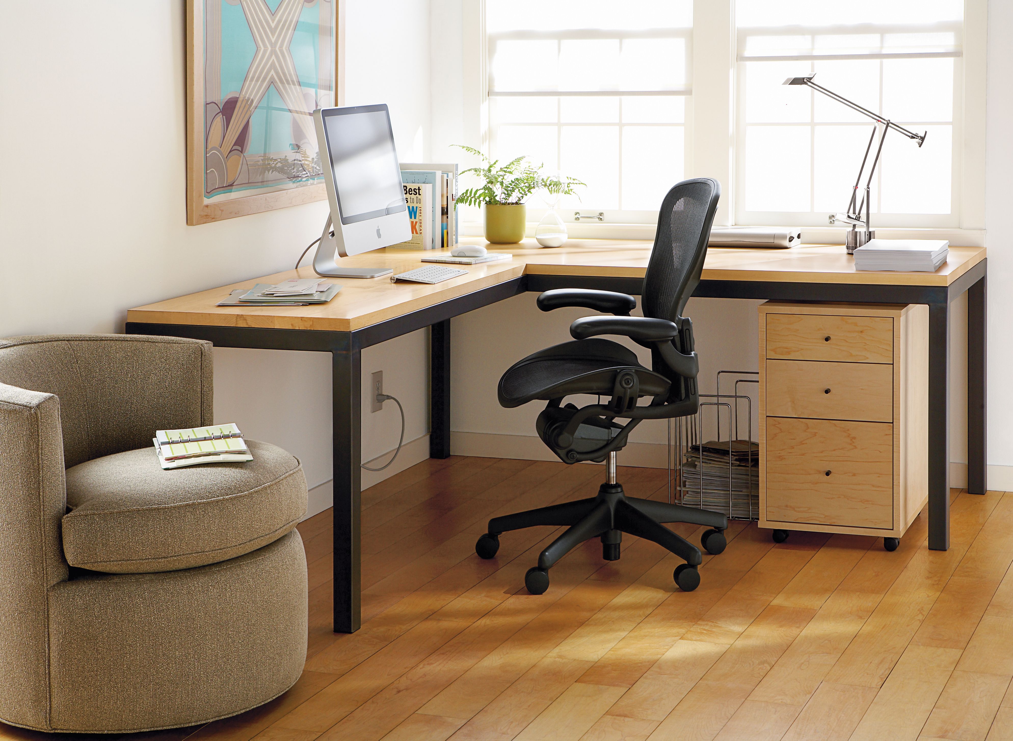 Parsons L-shaped desk with maple top.
