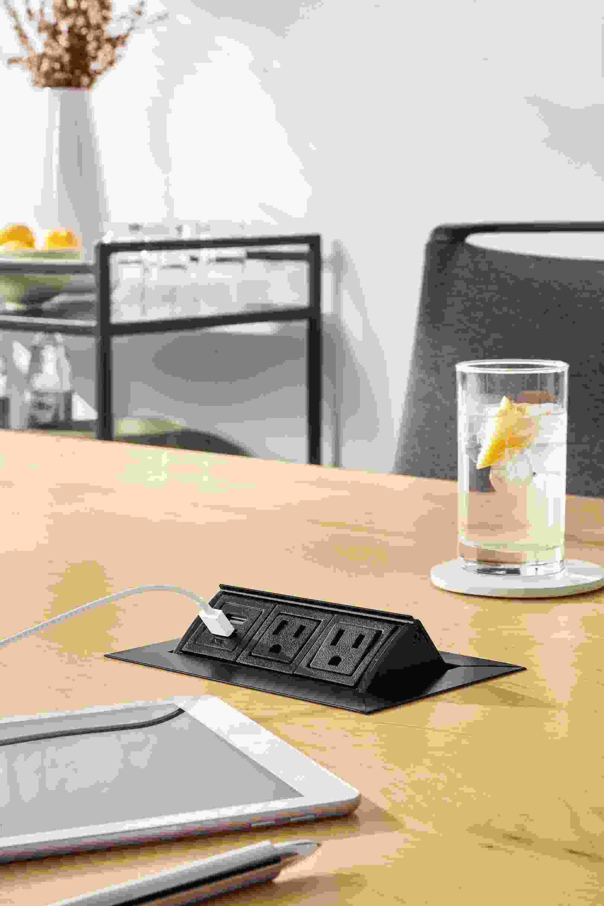 Close detail of outlet in Parsons table.