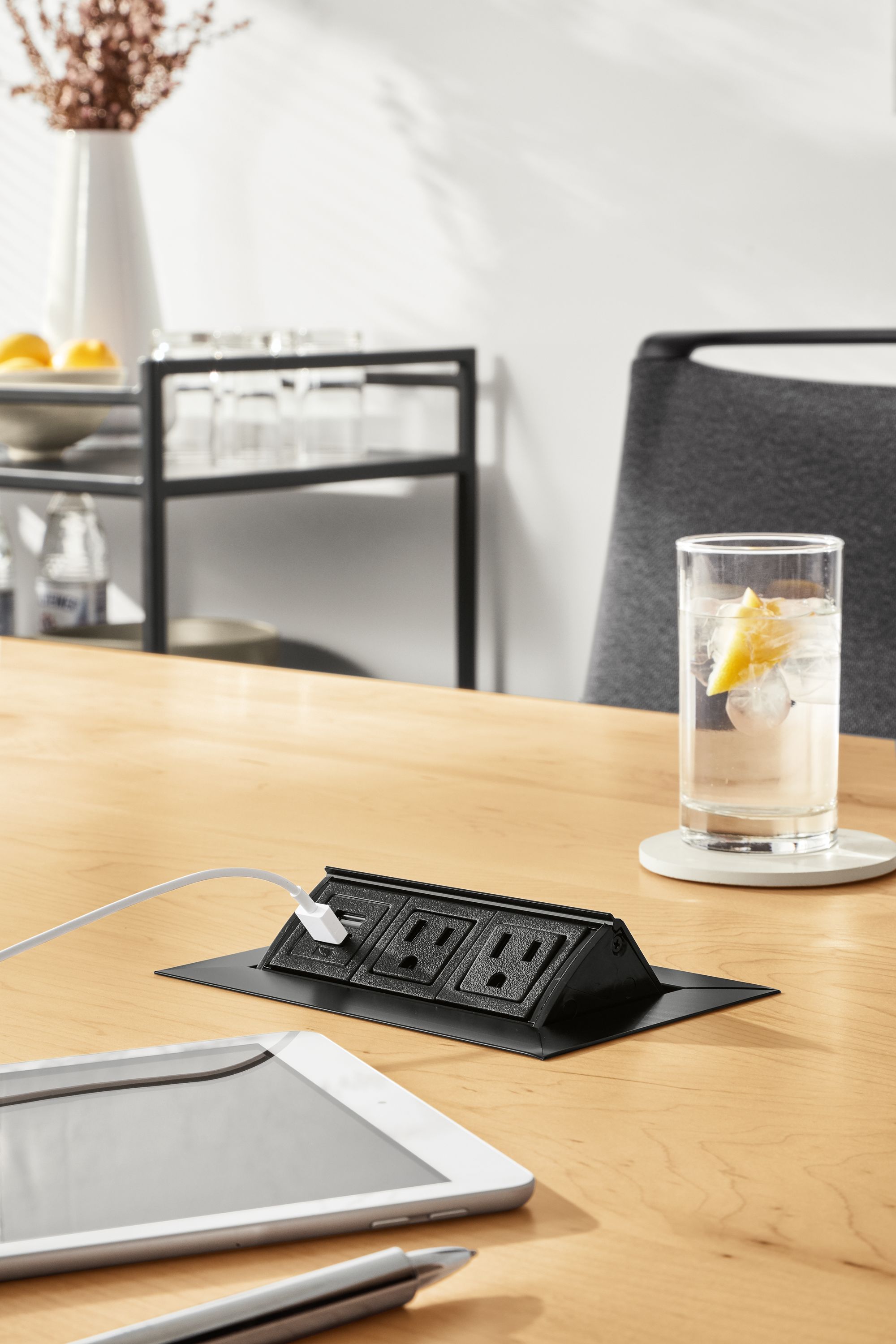 Close detail of outlet in Parsons table.