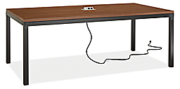 Angled view of Parsons 78-wide Table in Walnut with Tabletop 3-Port Power and Charging Outlet in Silver.