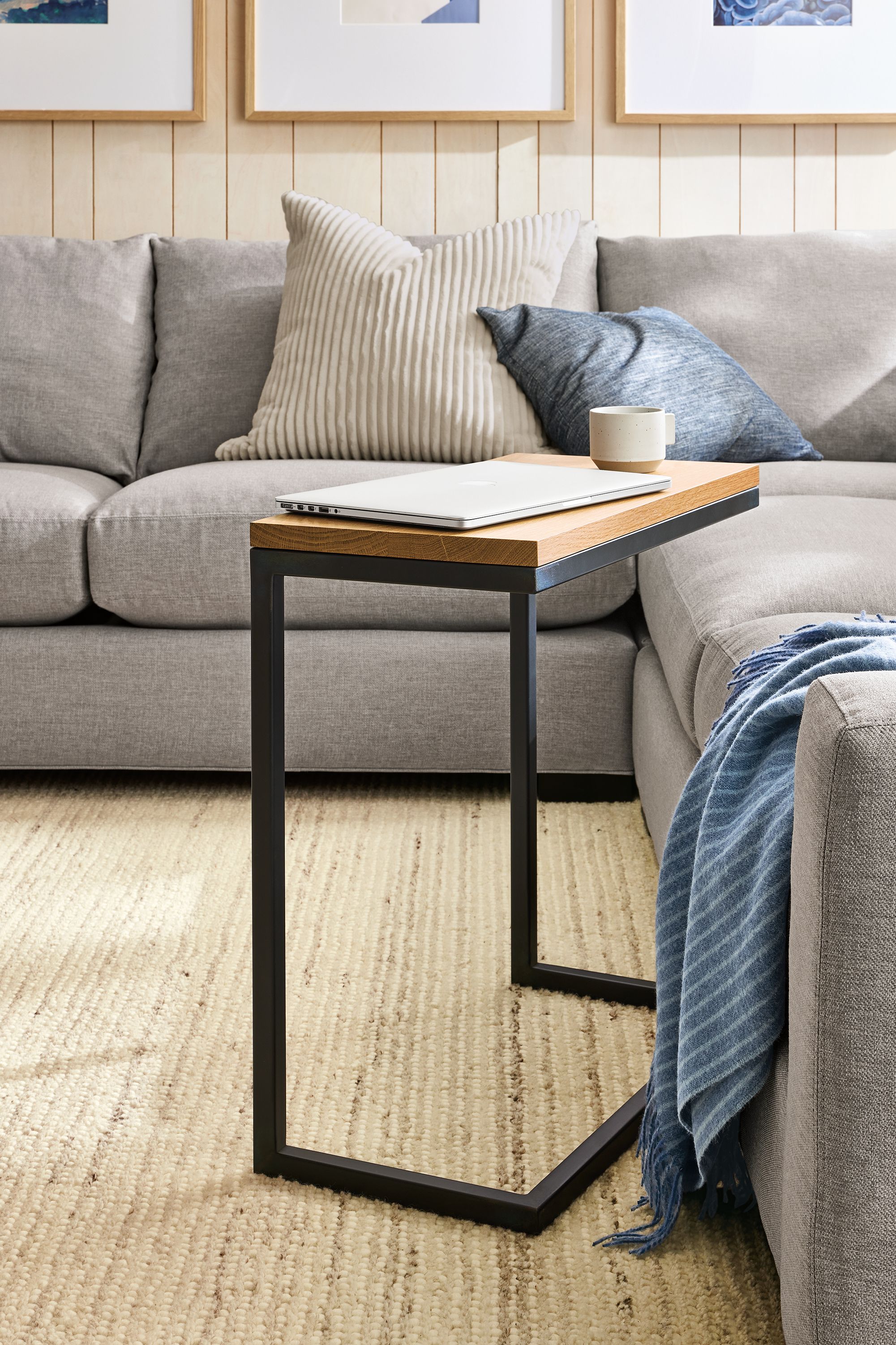 parsons c-table with white oak top beside metro sectional.