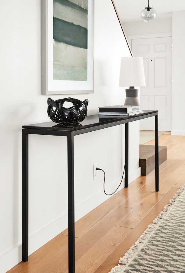Detail of Parsons thin leg console table.
