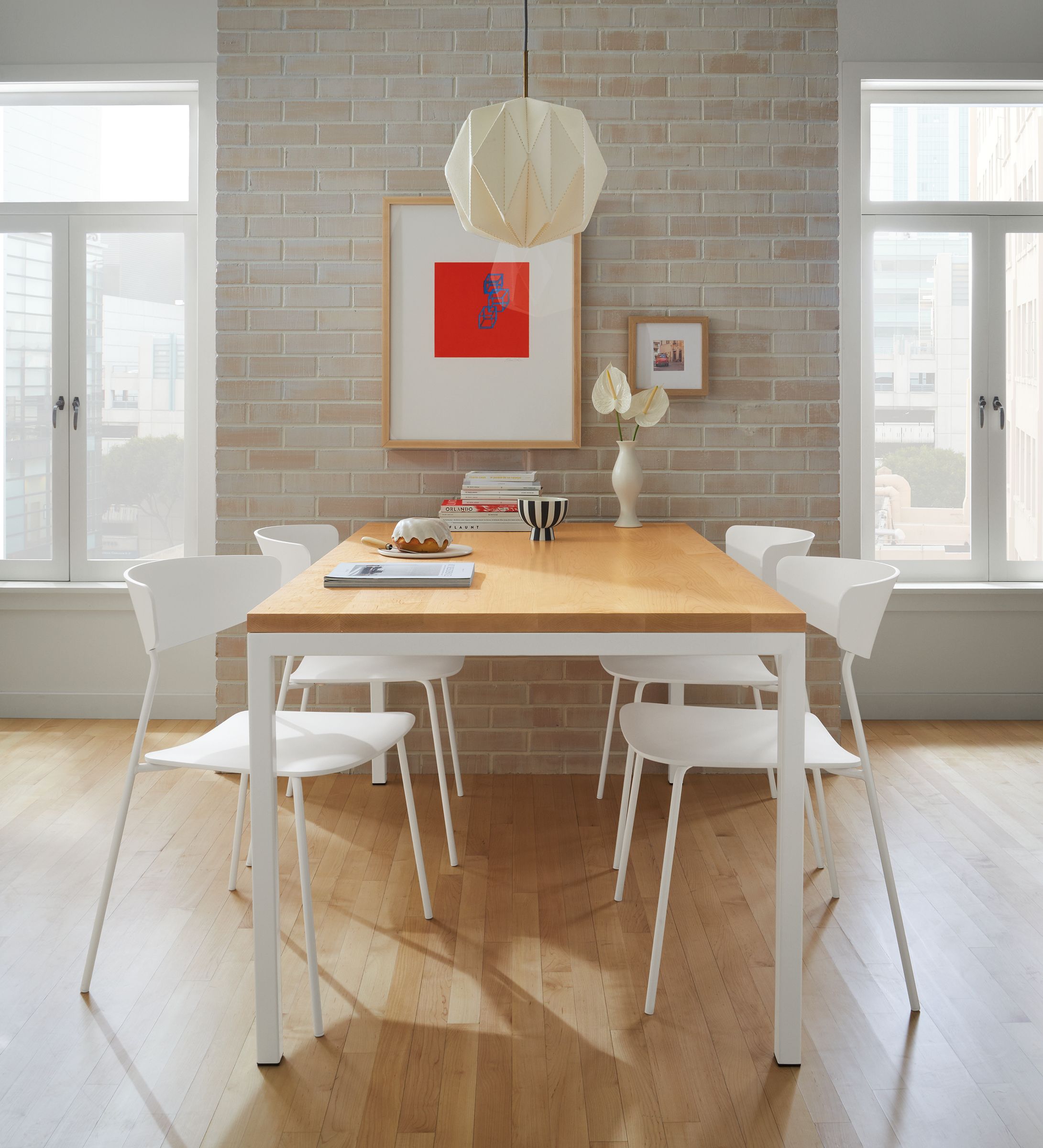 dining space with parsons table, wolfgang chairs, orikata pendant, juni van dyke wall art.