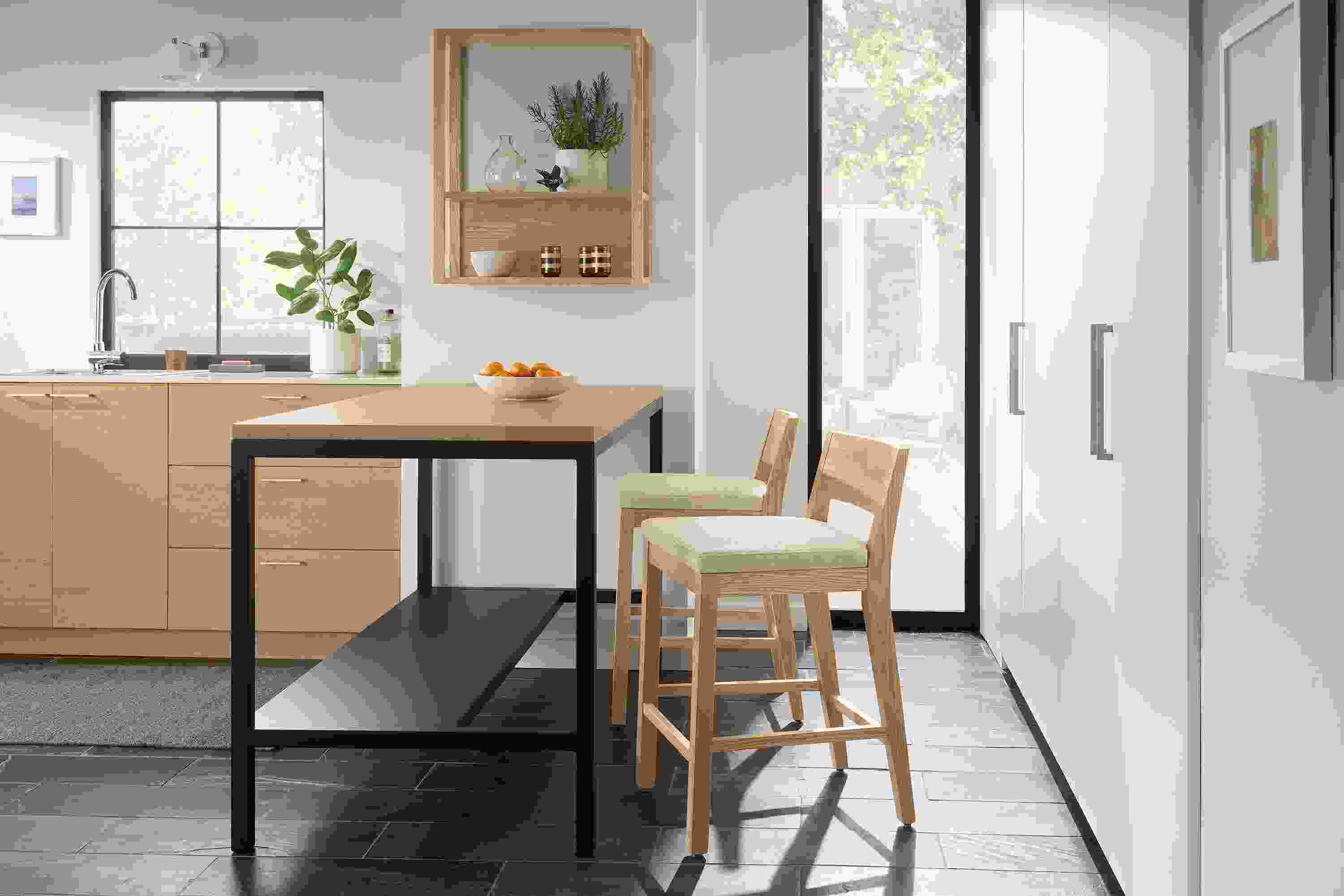 Kitchen with parsons counter table in rye on red oak and 2 afton counter stools in rye on red oak and tatum natural.