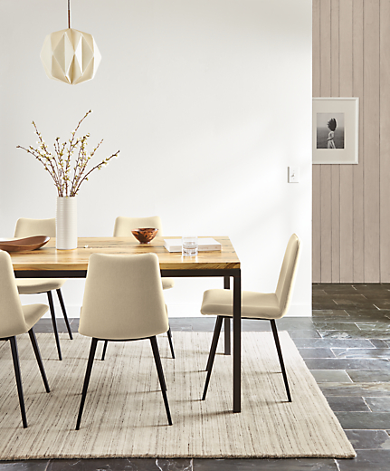 dining room featuring parsons dining table with natural steel base and sugarberry top