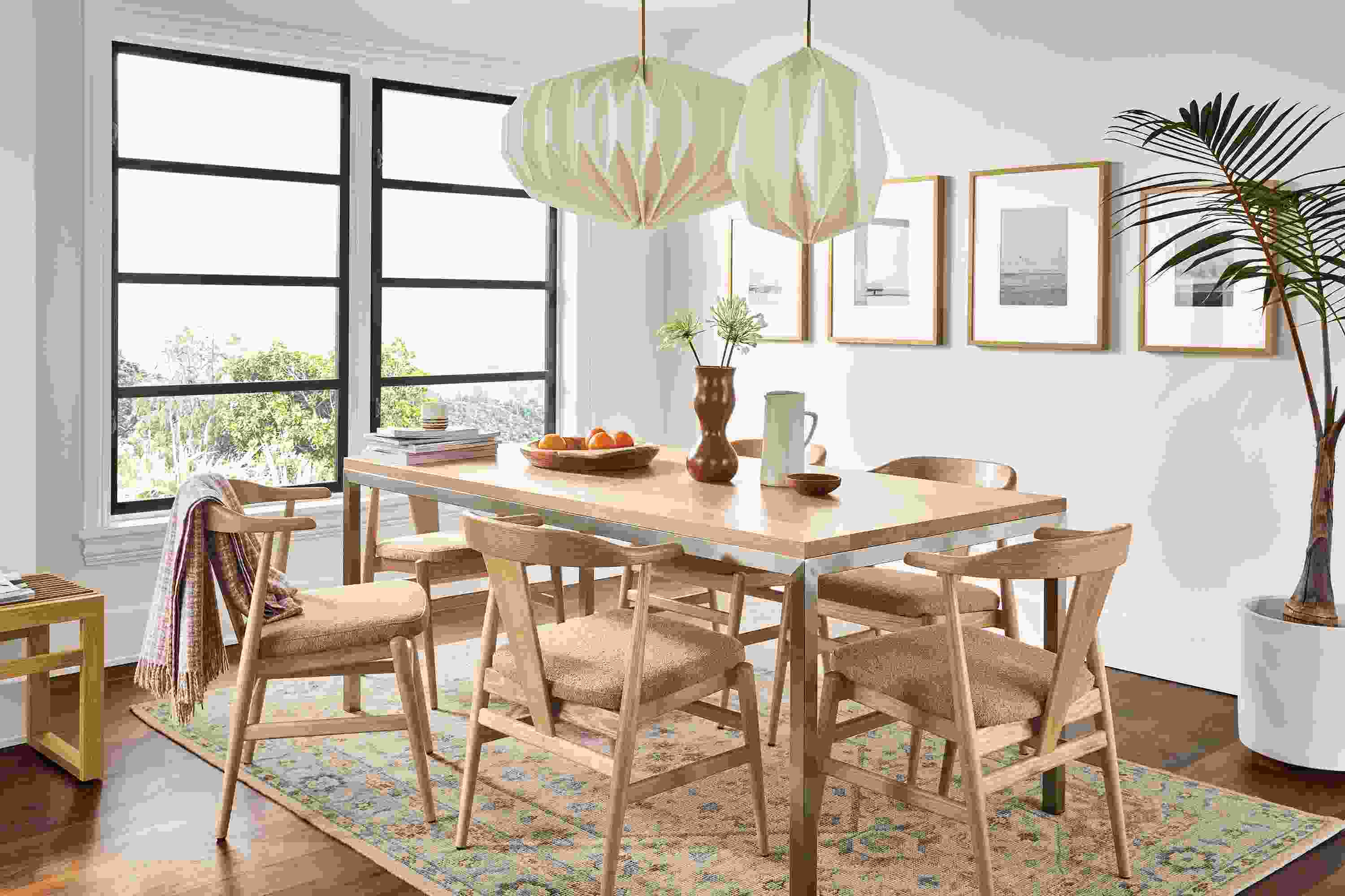 Dining room with Parsons table in stainless and rye on red oak and evan arm chairs in rye on red oak.