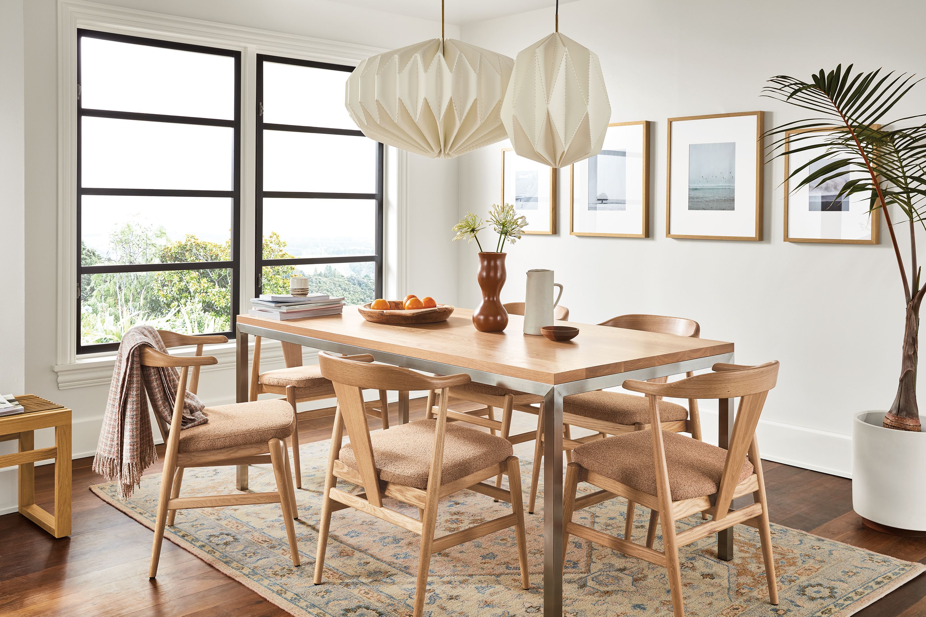 Dining room with Parsons table in stainless and rye on red oak and evan arm chairs in rye on red oak.