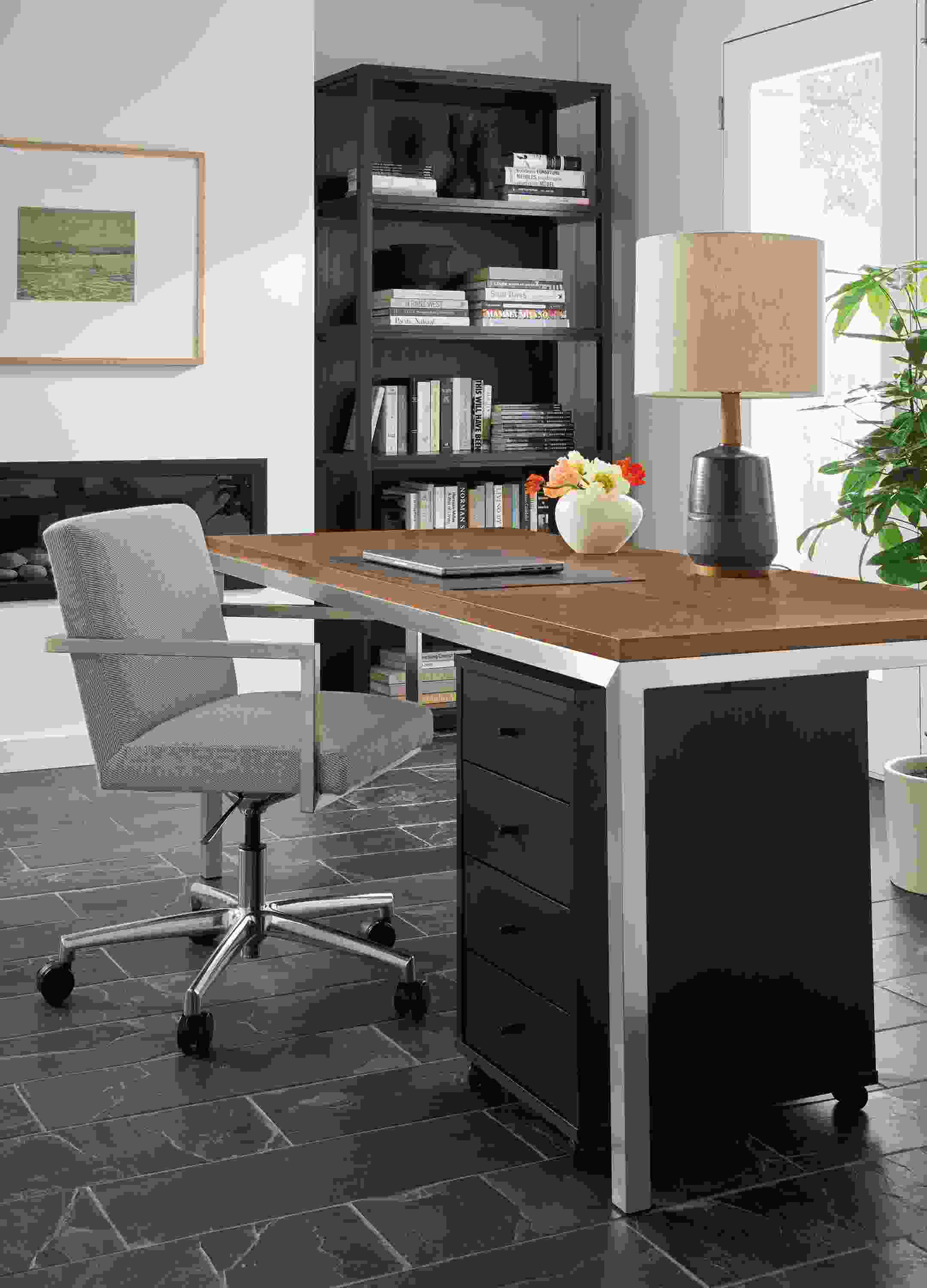 Office with Parsons 72-wide table in stainless and walnut, Lira office chair in Derry Slate and Fable bookcase in charcoal on cherry.