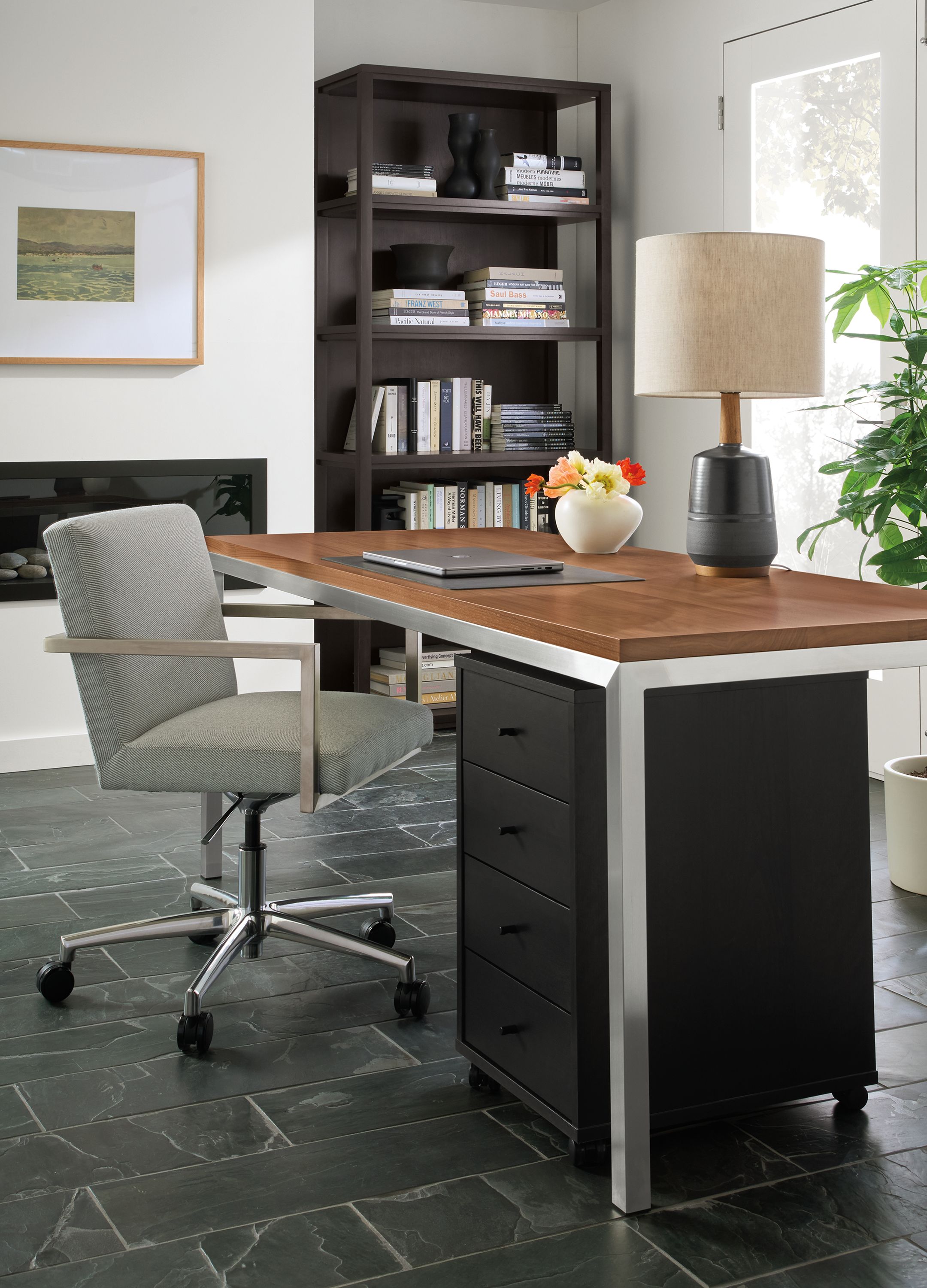 Office with Parsons 72-wide table in stainless and walnut, Lira office chair in Derry Slate and Fable bookcase in charcoal on cherry.