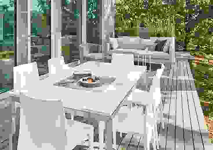Outdoor space with Parsons table, Bellini chairs, Palm sofa, Ambrose swivel chair.