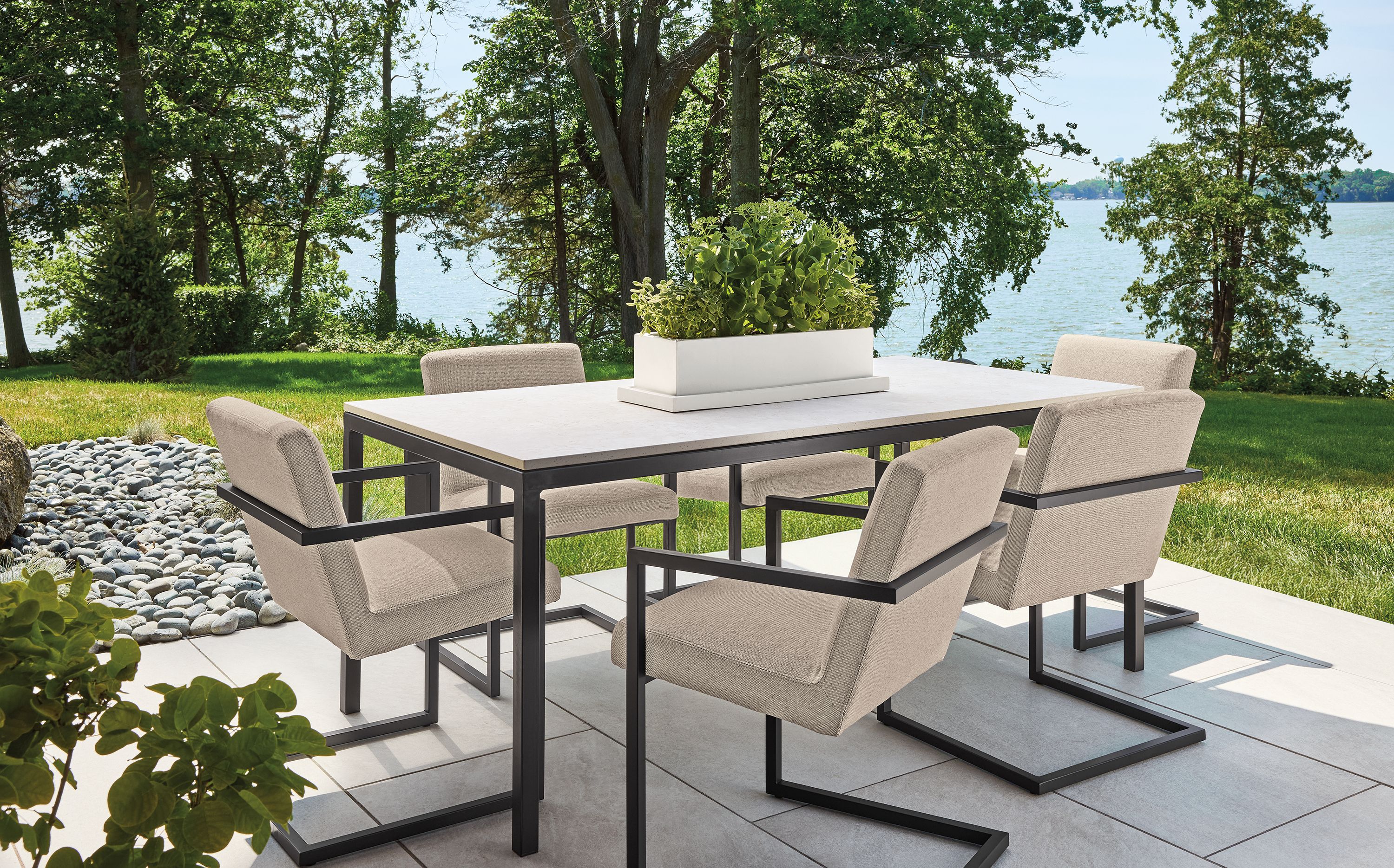 Arm chair in Mist oatmeal fabric with graphite frame