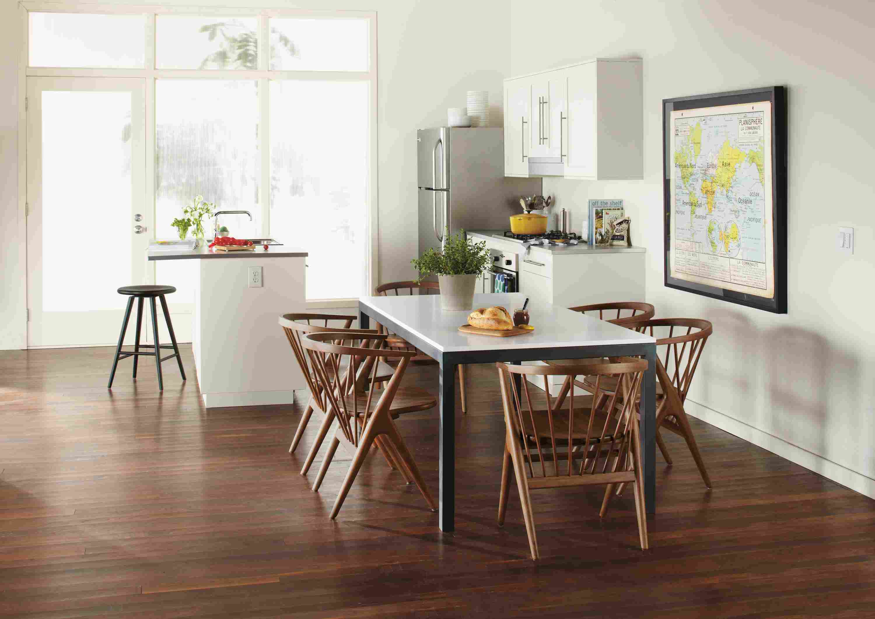 Dining setting with parsons 72-wide by 36-deep dining room table with white MDF top and Soren dining chairs.