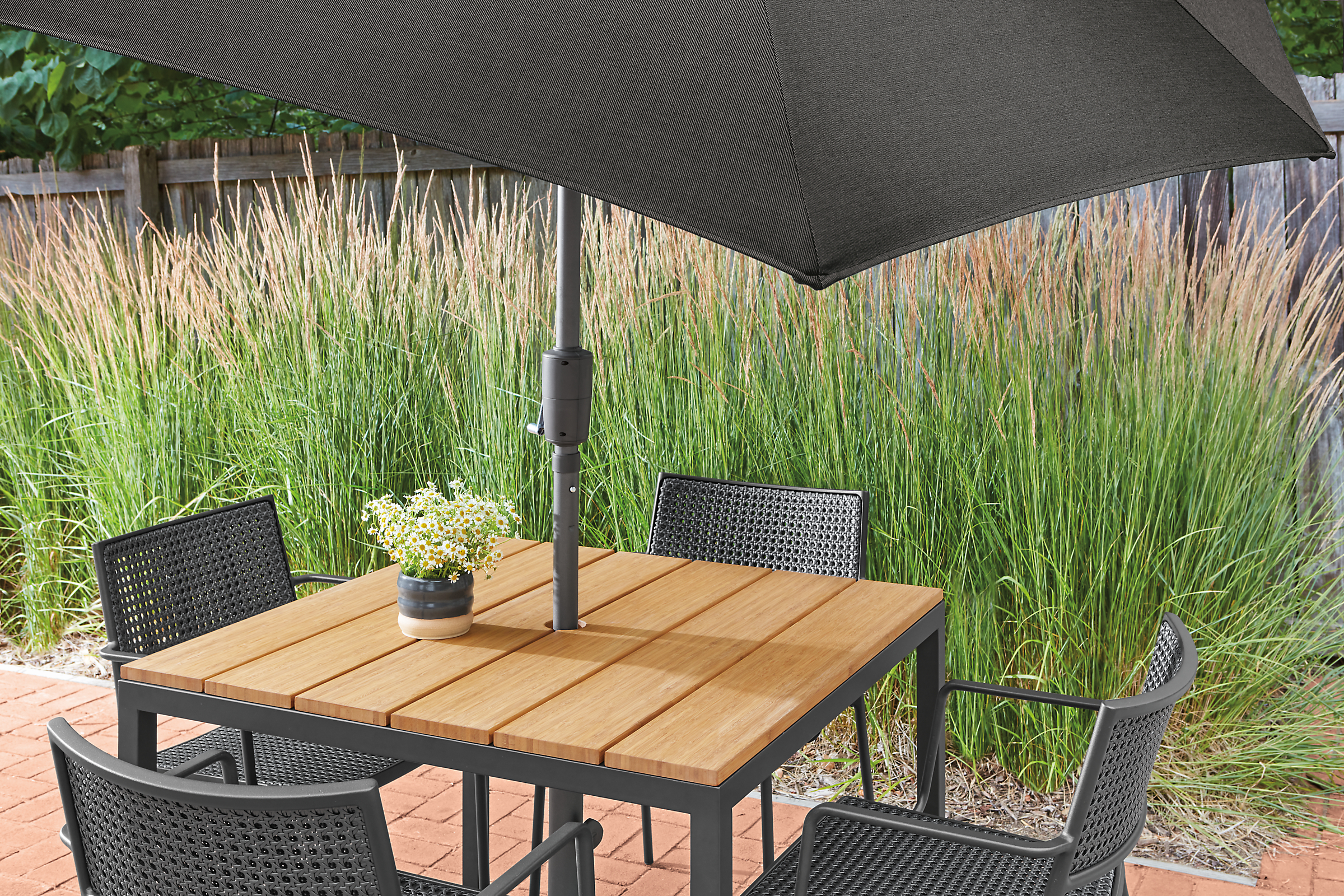 Outdoor setting with parsons 36-by-36 outdoor table with plat chair in graphite.