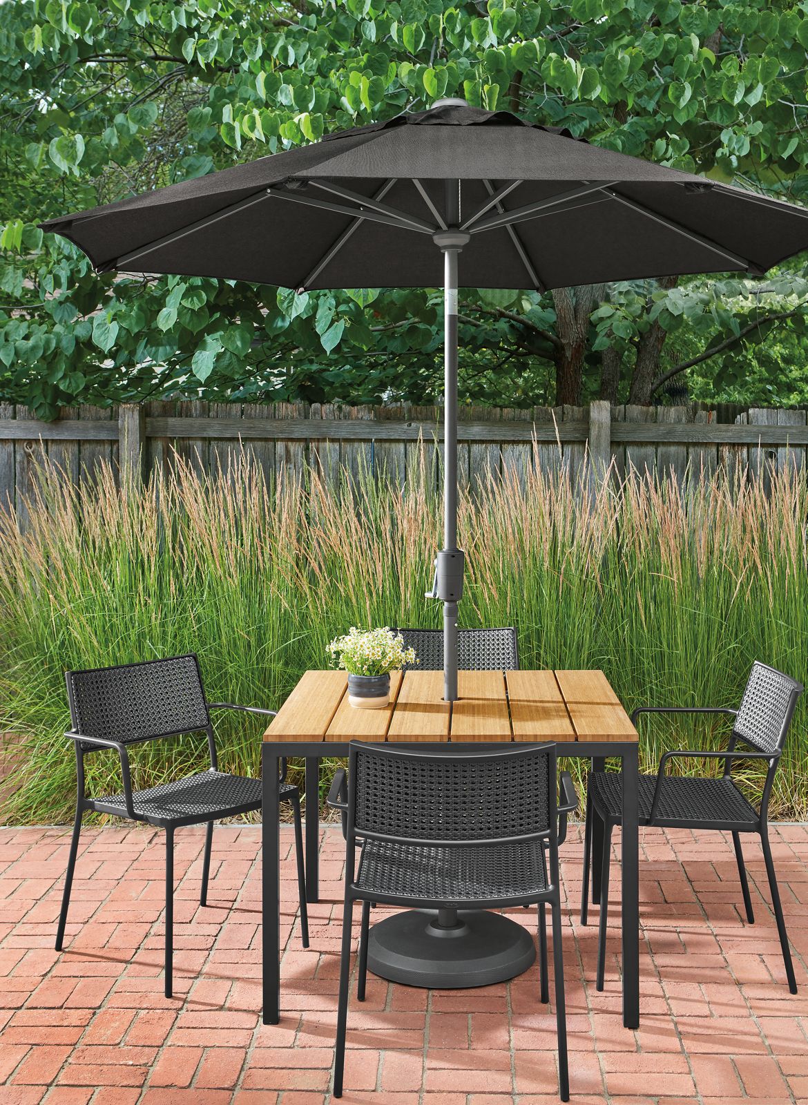 Outdoor setting with parsons 36-by-36 outdoor table with plat chair in graphite.