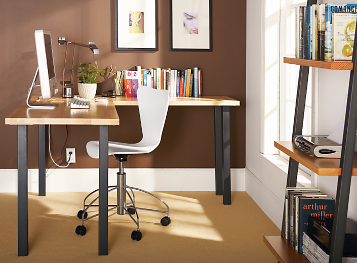 Office Setting of Parsons Leg L-shaped Desk in Maple and natural steel.