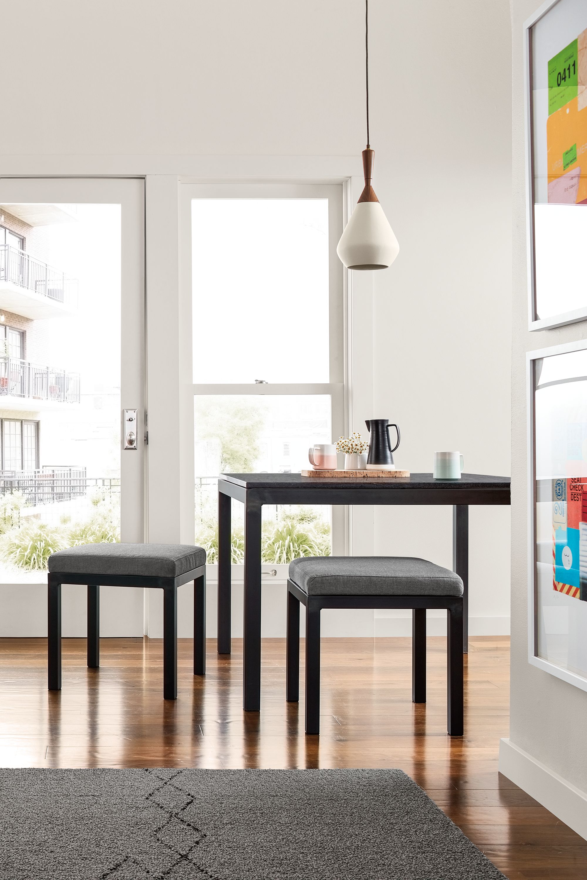 Dining room with Parsons bench in natural steel.