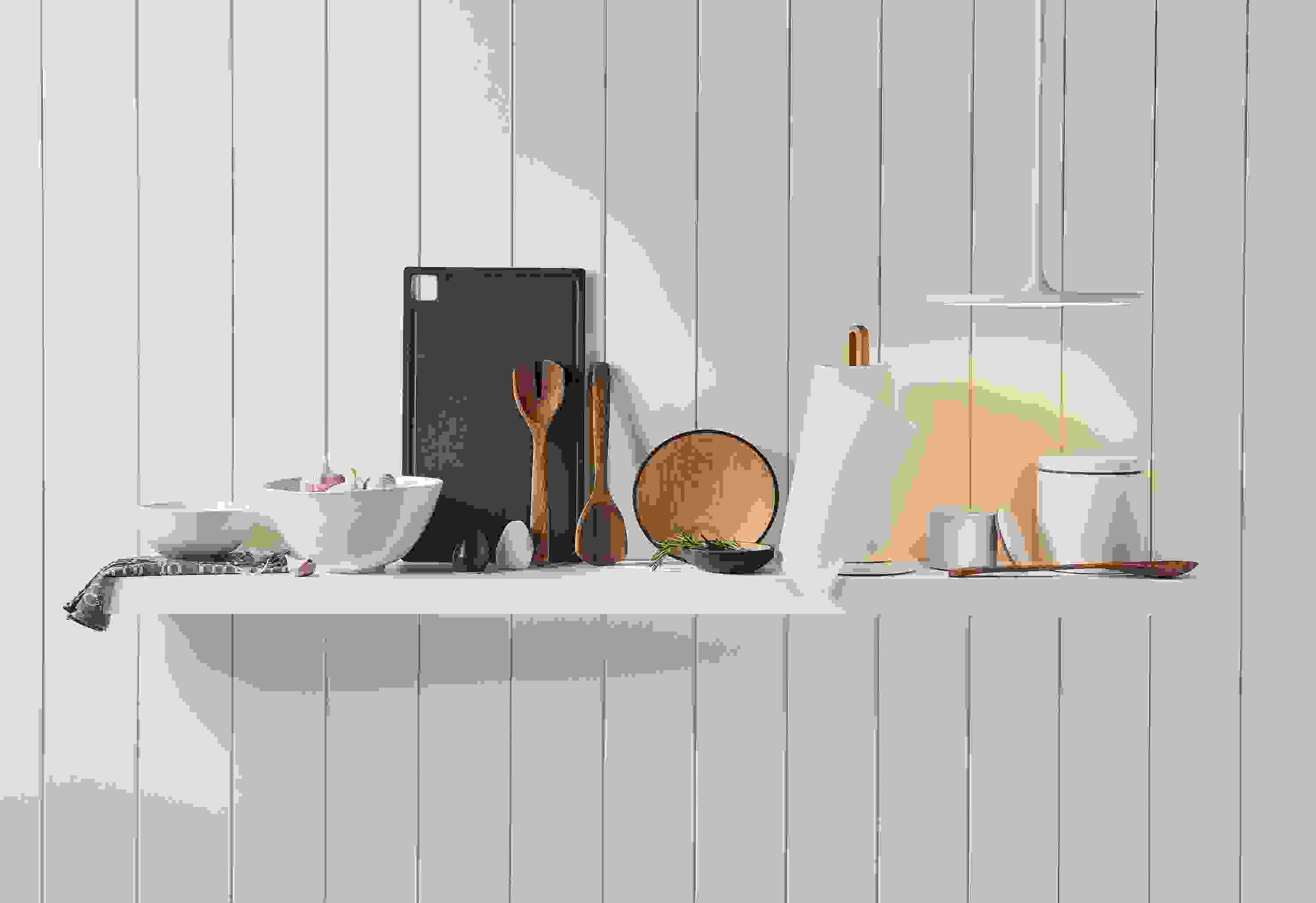 Kitchen setting with Anya bowls in white and a variety of kitchen accessories.