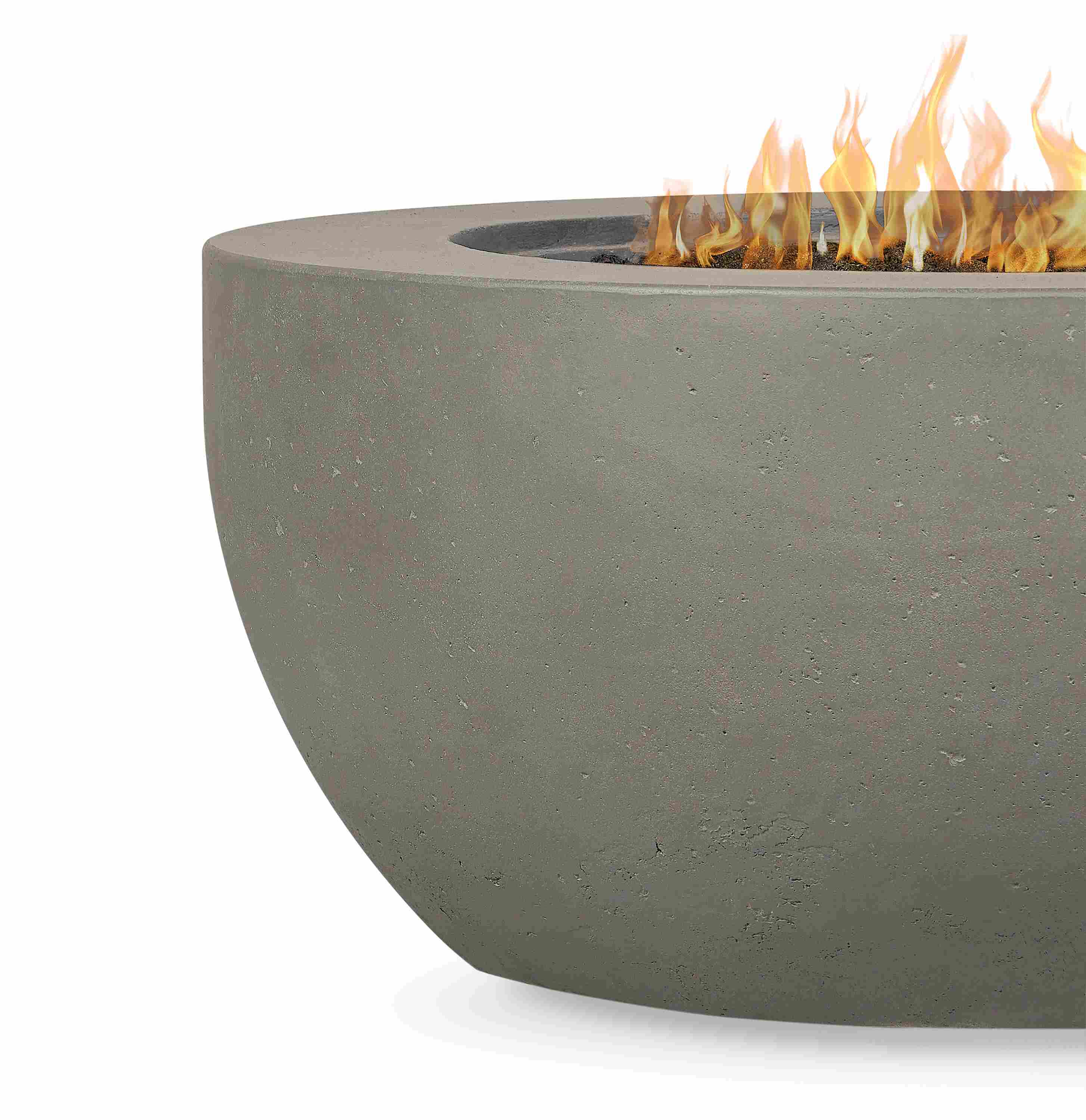Detail of a  lit Pele 44-diameter outdoor propane fire table in grey concrete.