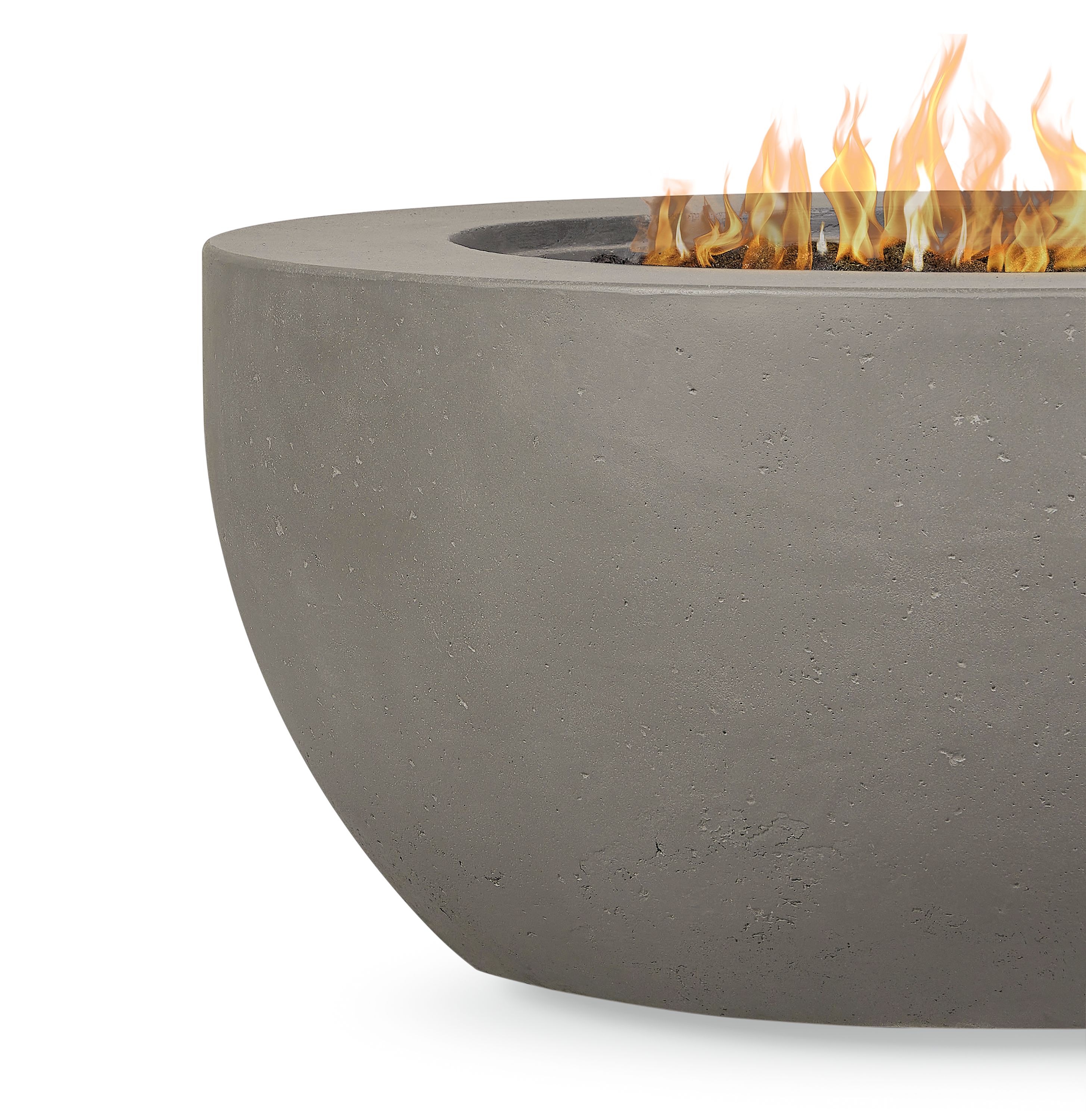 Detail of a  lit Pele 44-diameter outdoor propane fire table in grey concrete.