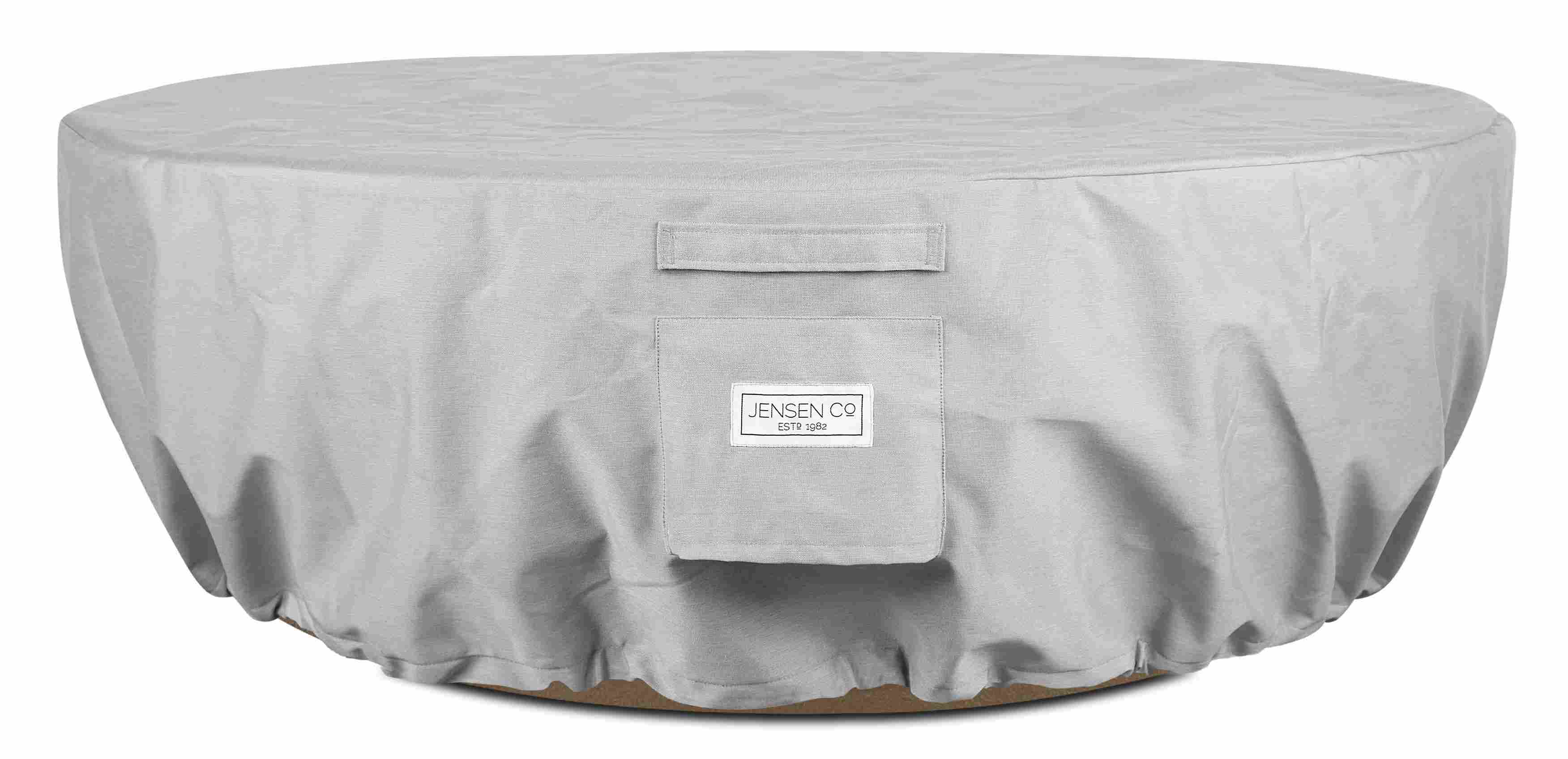 Detail view of the Pele outdoor fire table with outdoor cover.