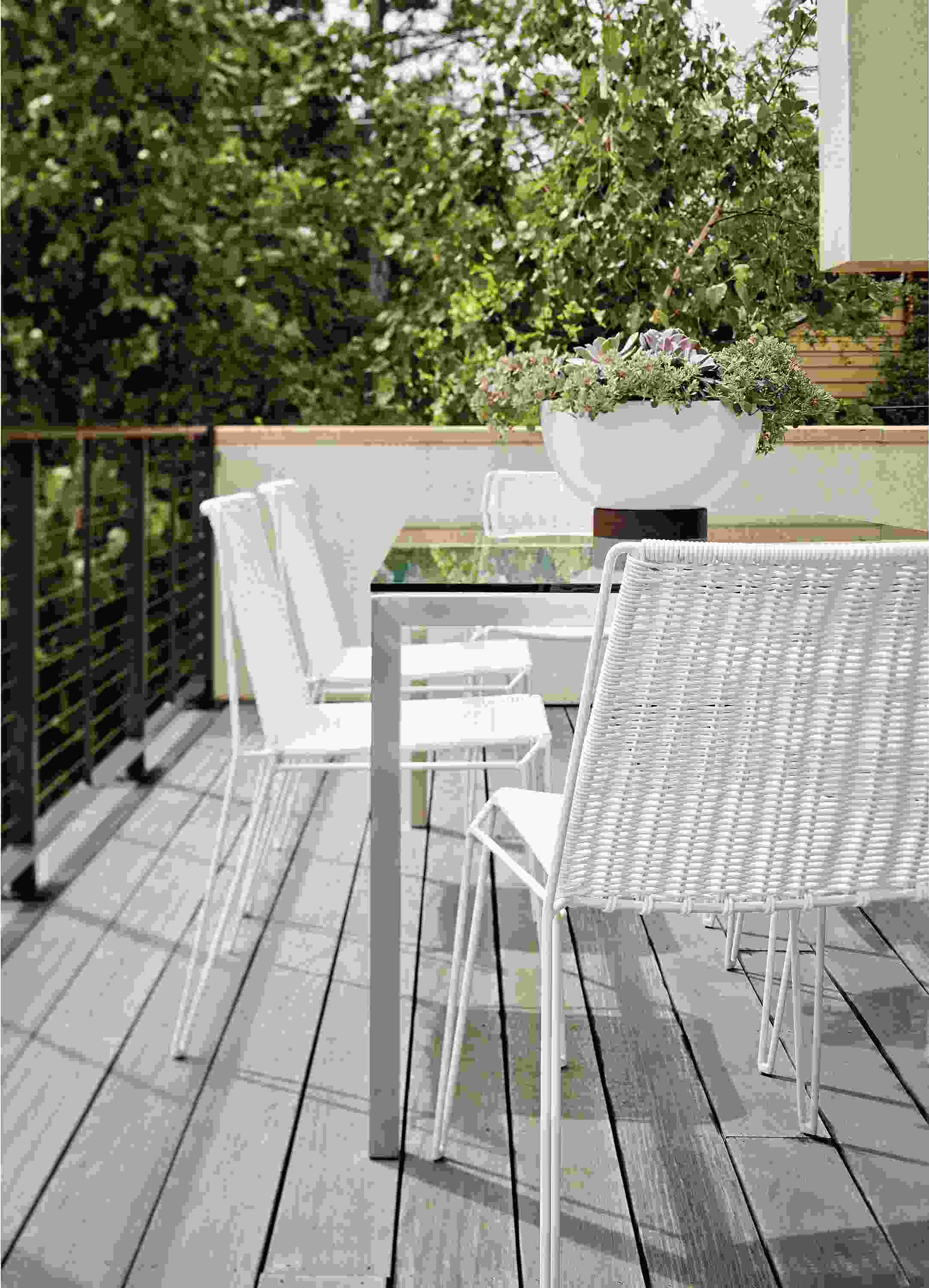 Patio with Penelope dining chair in white.