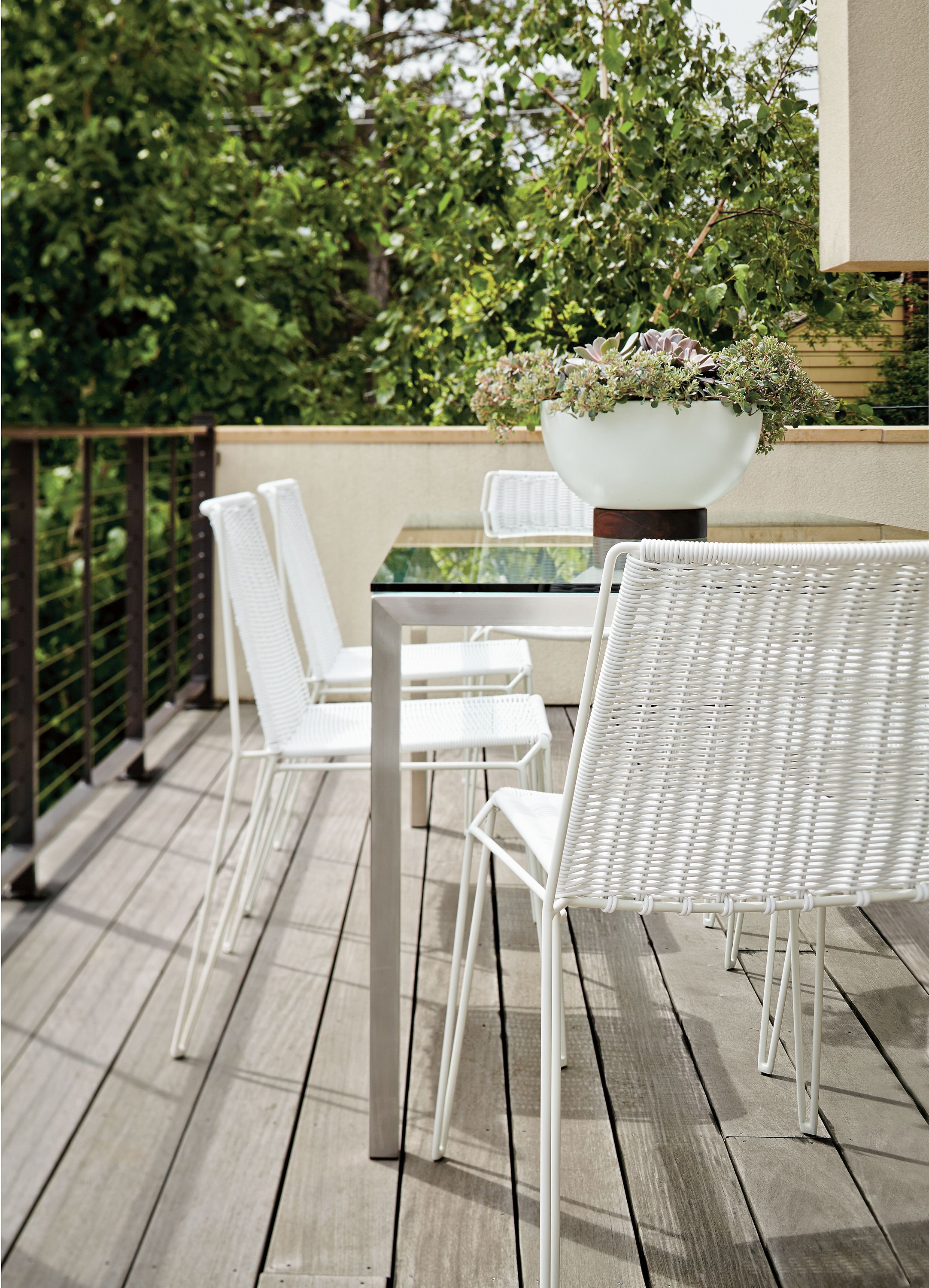 Patio with Penelope dining chair in white.