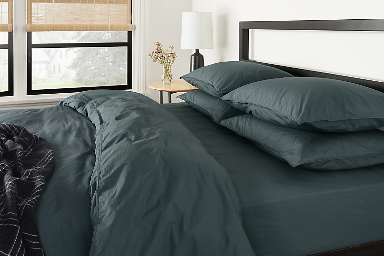 Detail view of Signature Percale Queen duvet cover in dark slate.