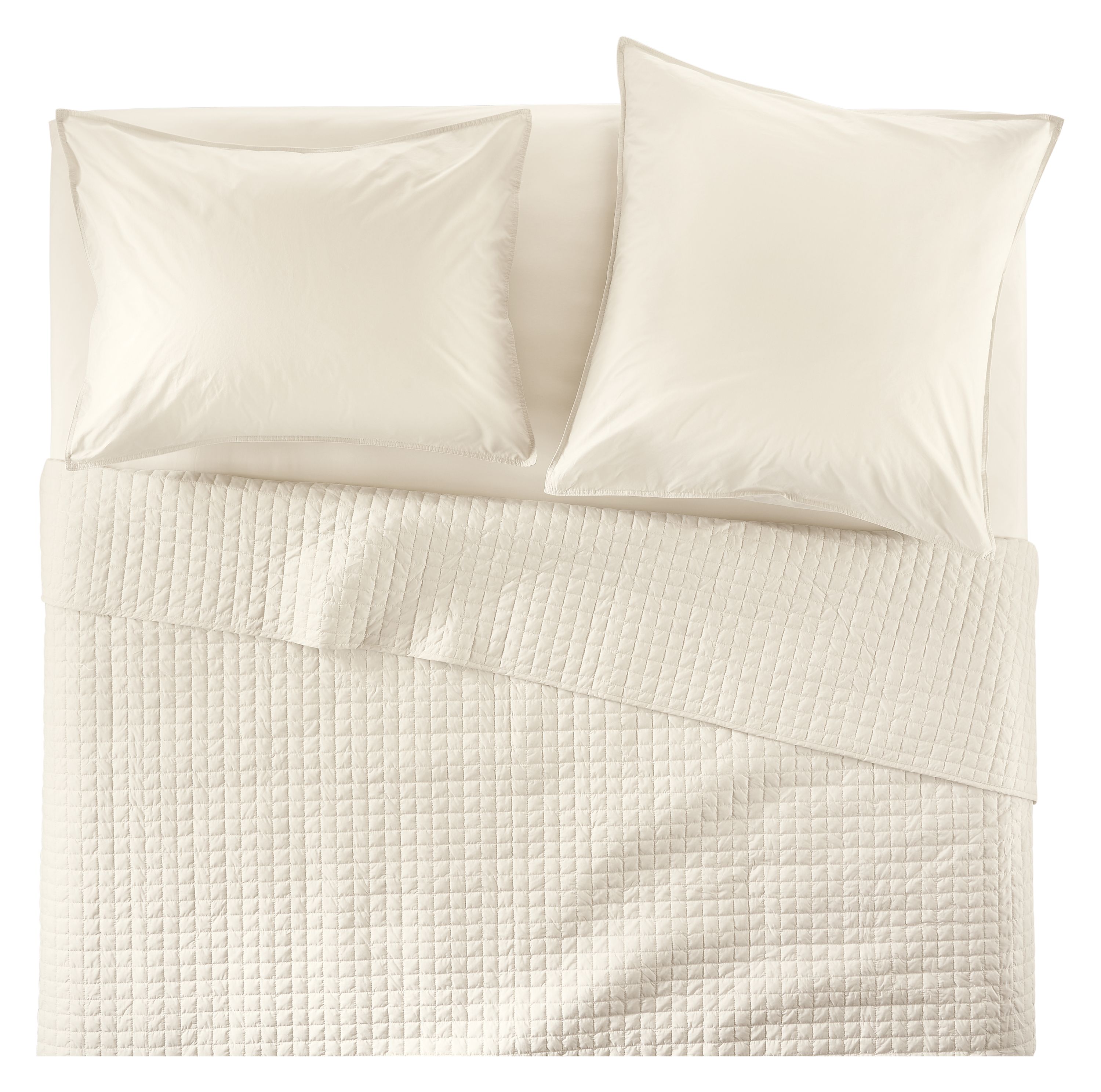 Overhead view of Core queen bed with Signature Percale quilted coverlet, fitted sheet and shams in Ecru.
