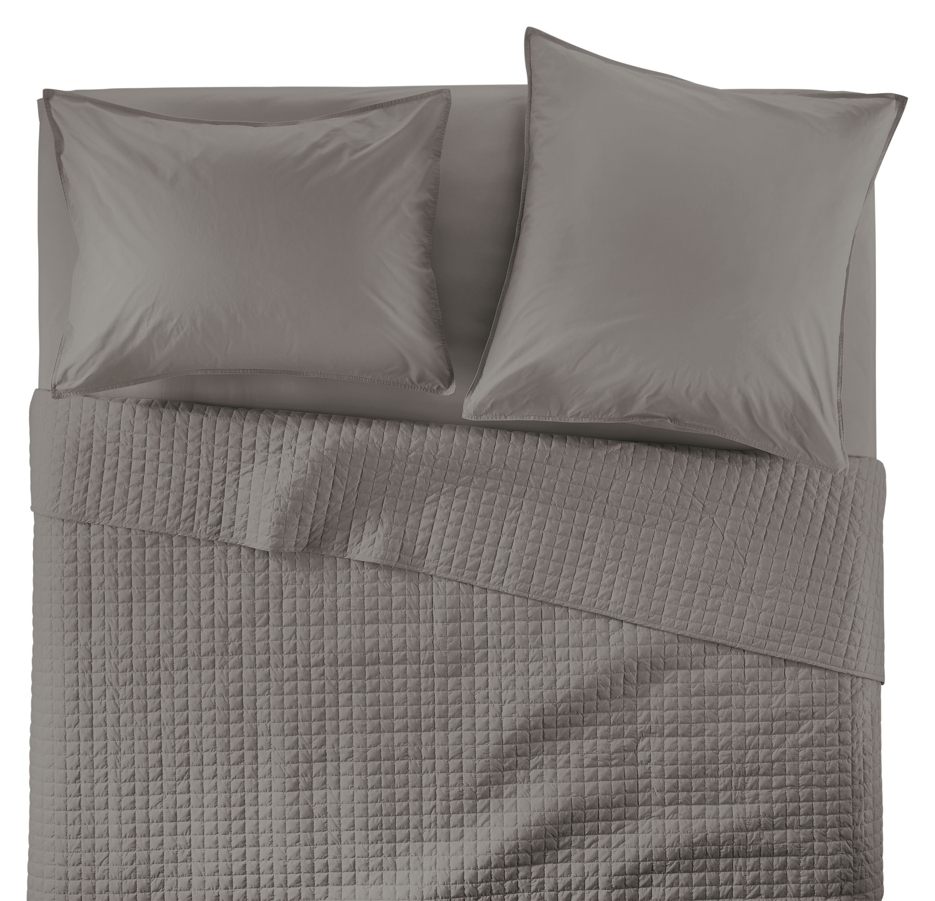 Overhead view of Core queen bed with Signature Percale quilted coverlet, fitted sheet and shams in charcoal.