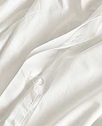 Detail of Signature Percale Full-Queen Duvet Cover in White.