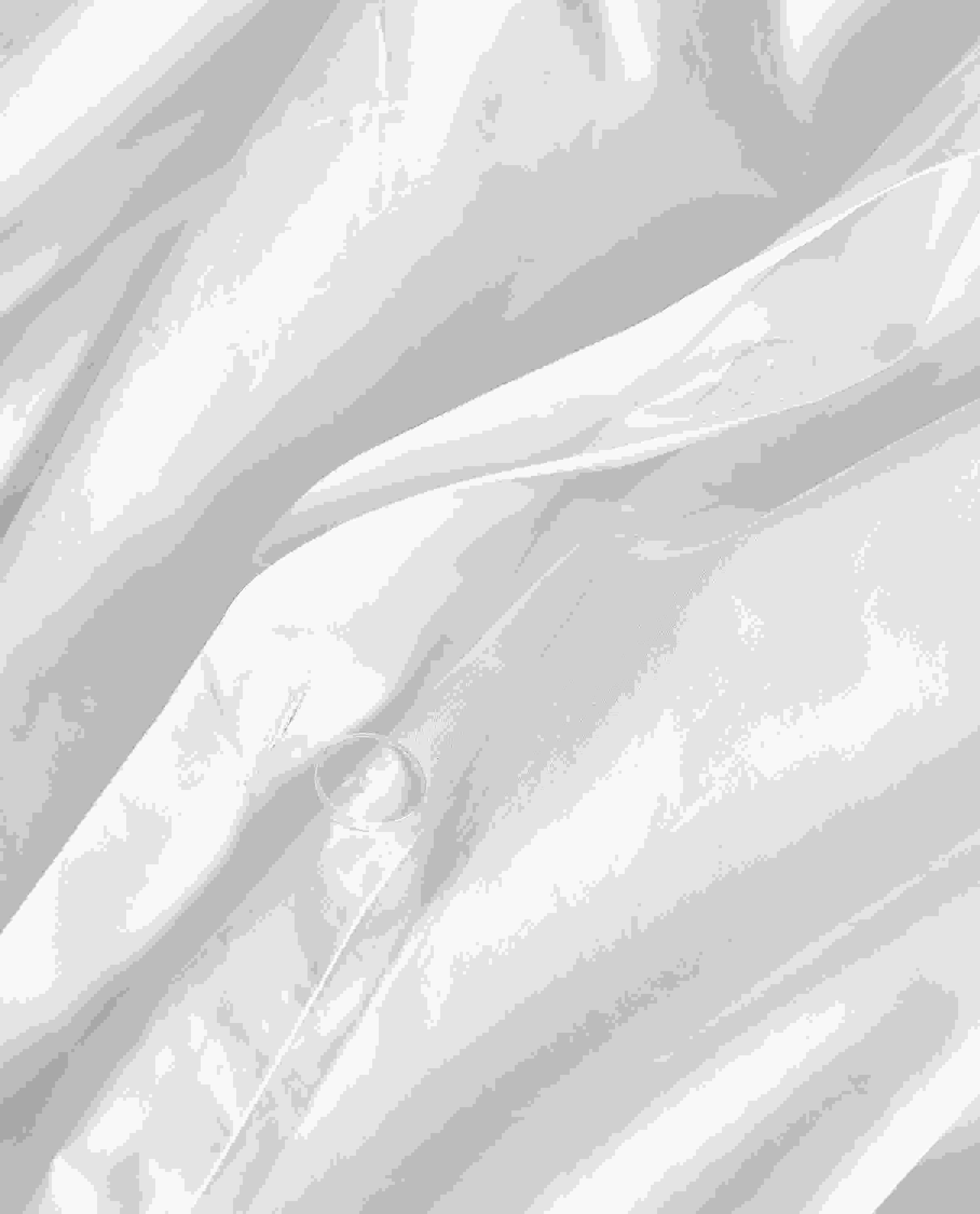 Detail of Signature Percale Full-Queen Duvet Cover in White.