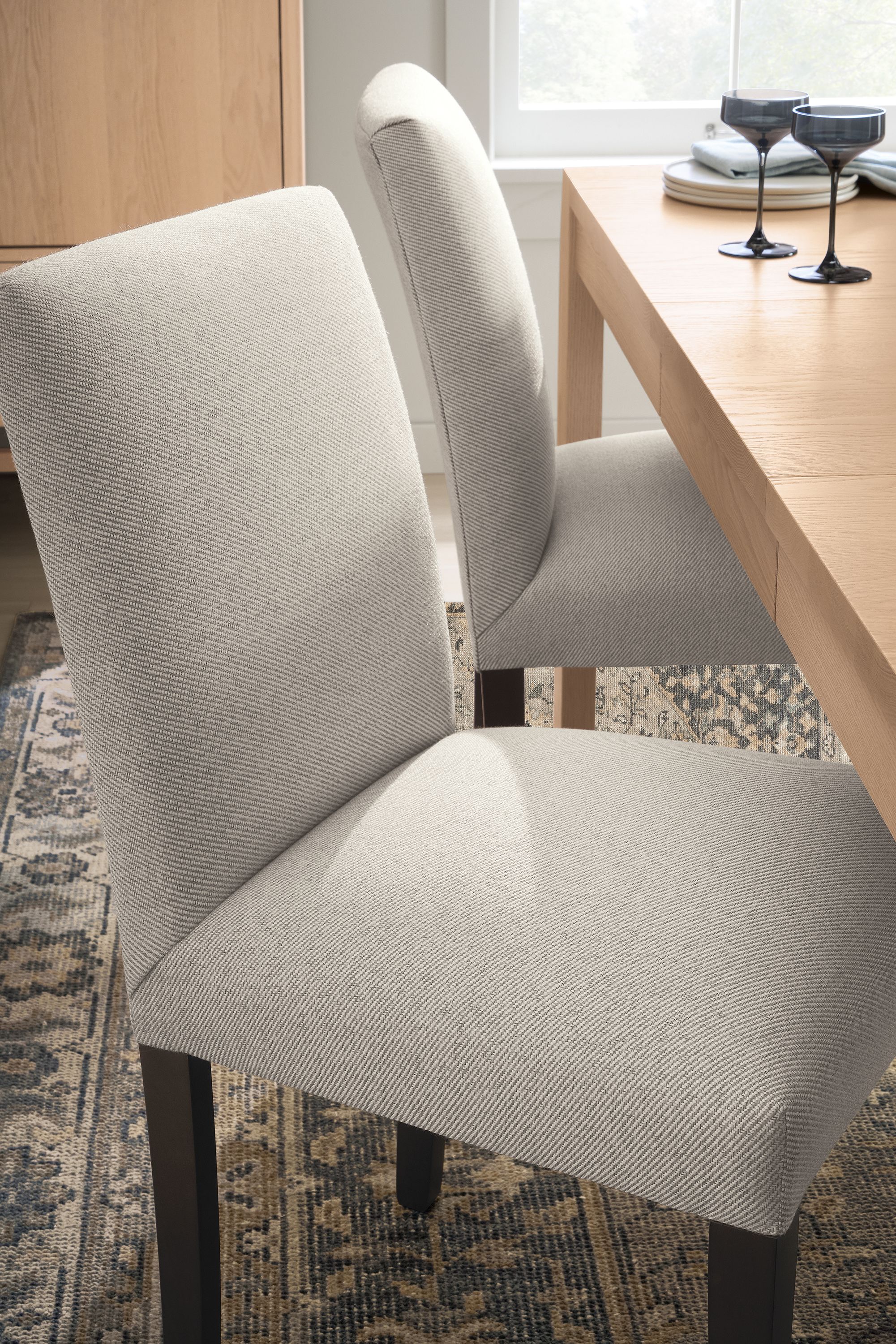 Chair in Derry natural fabric with charcoal legs