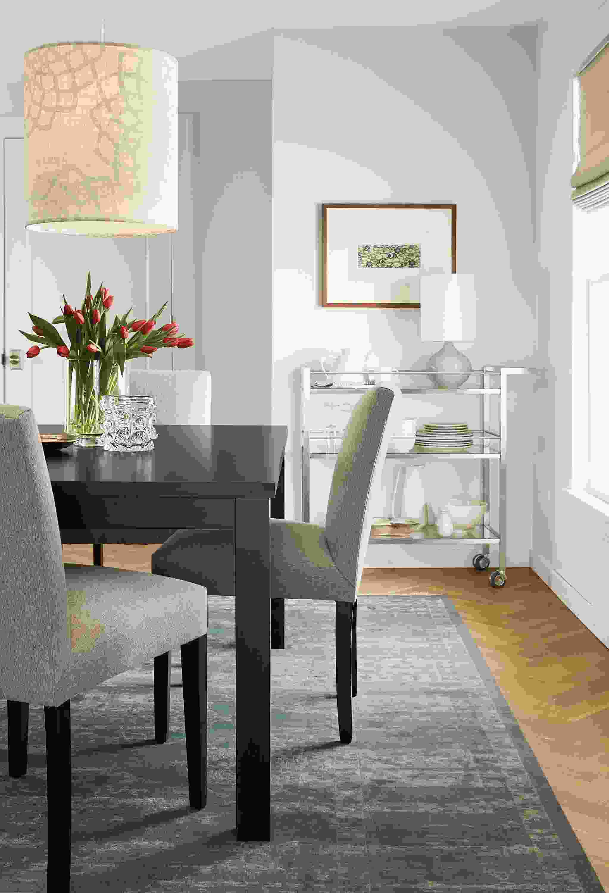 Detail of Peyton dining chair with flint ivory fabric seat.