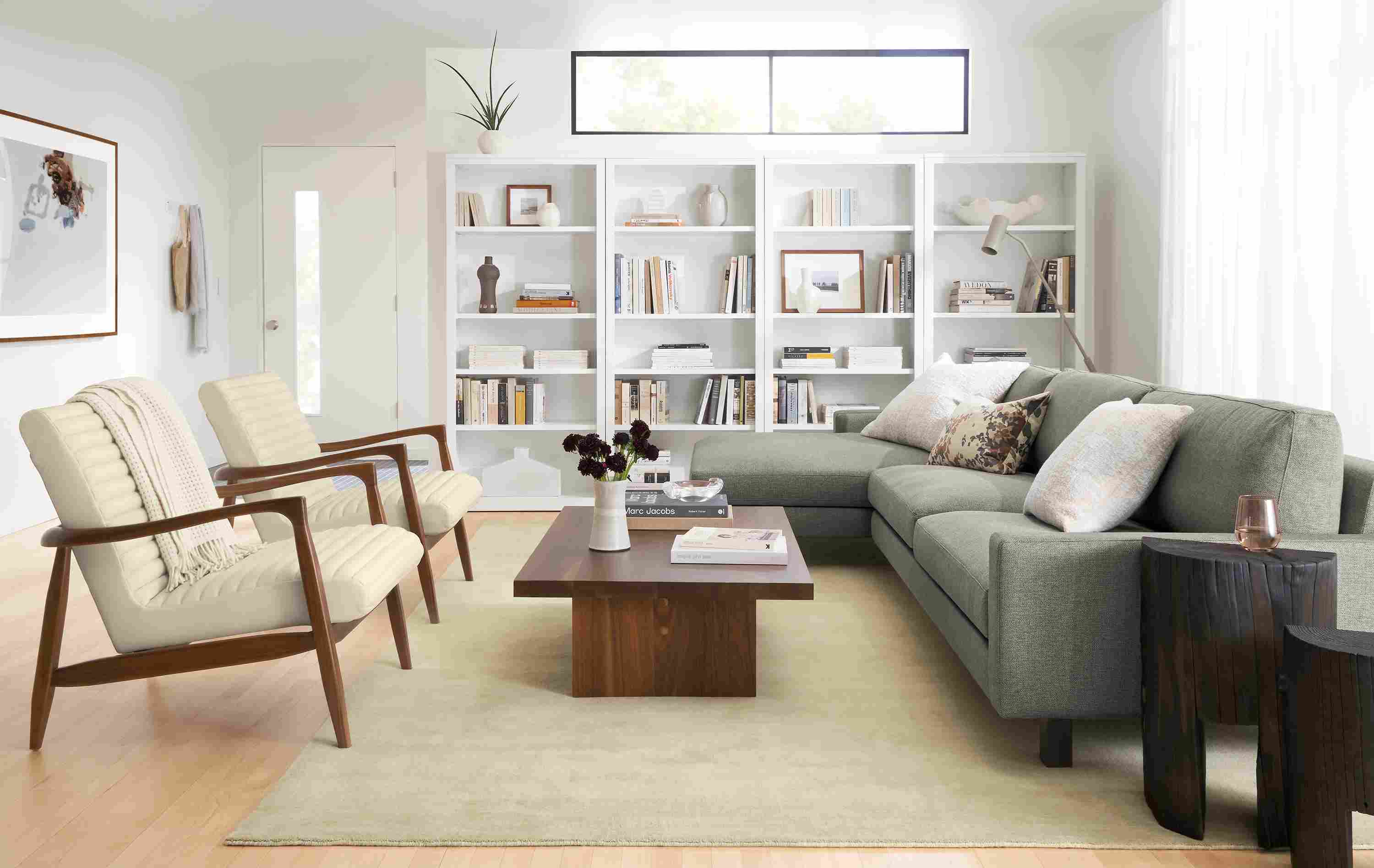 room setting including pierson sofa with chaise, 2 callan chairs and corbett coffee table.