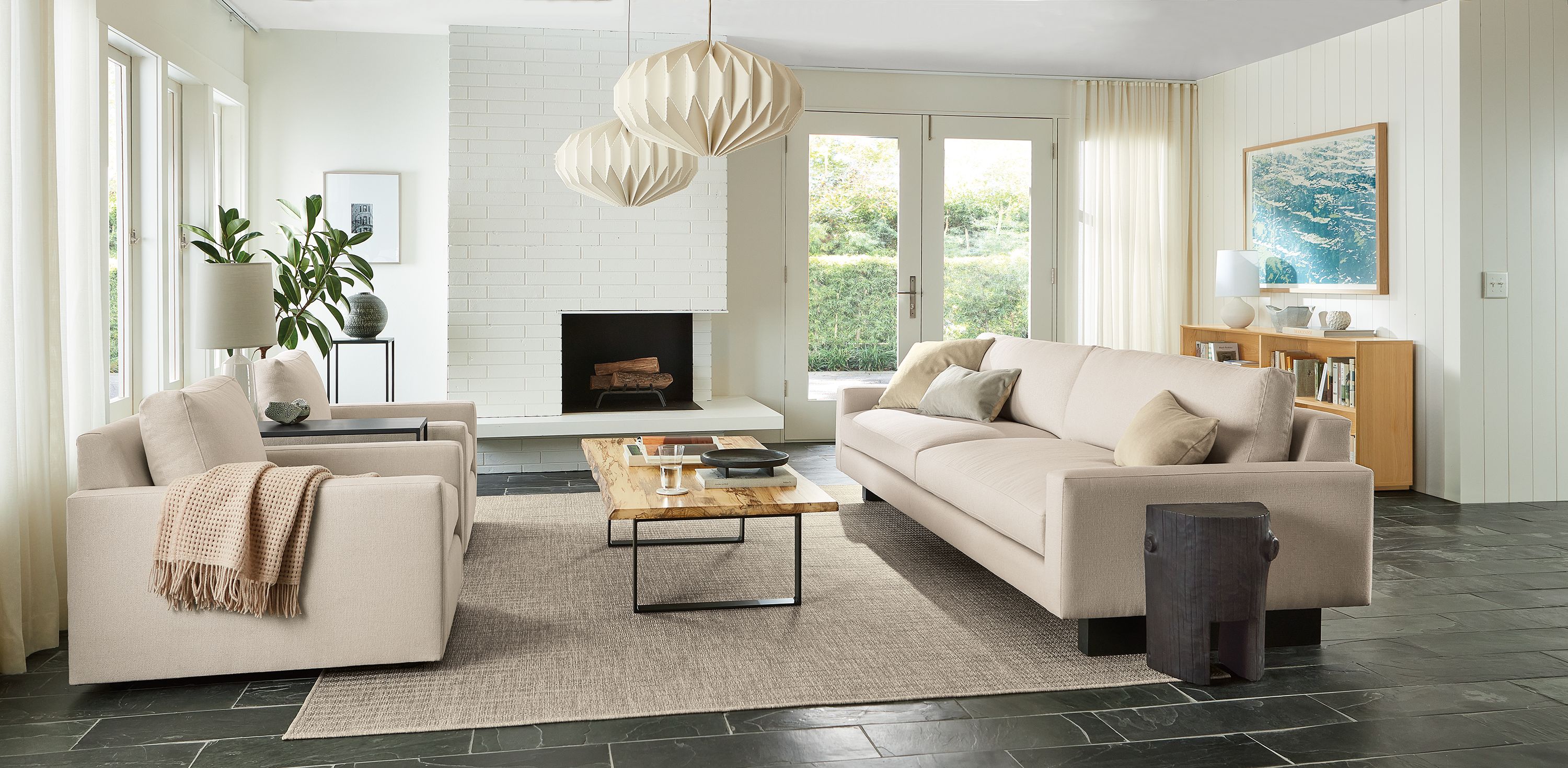 Living room with Pierson sofa and Linger chairs in Hines oatmeal,  and Chilton coffee table in spalted sugarberry.