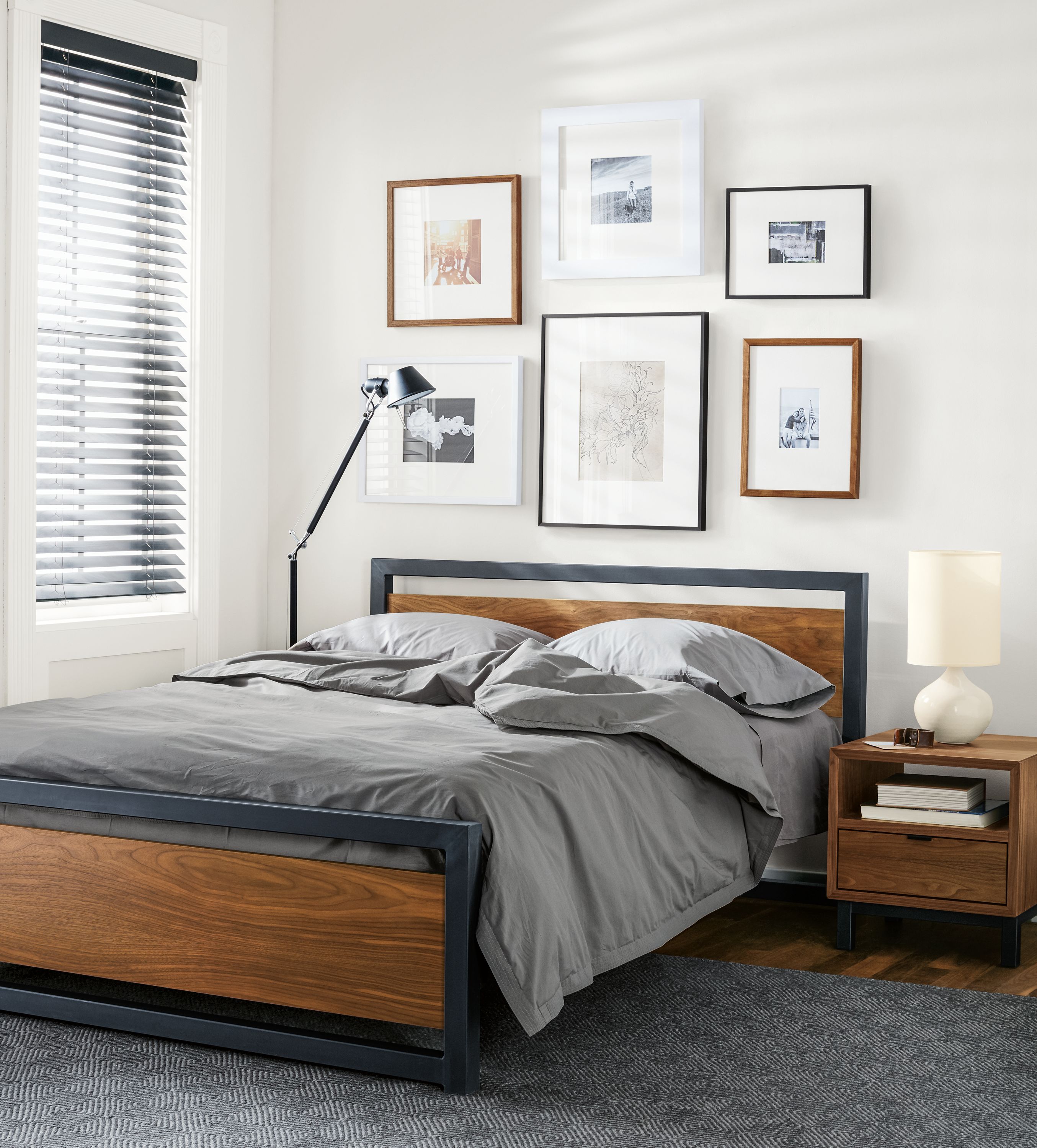 Queen bed in walnut with natural steel frame
