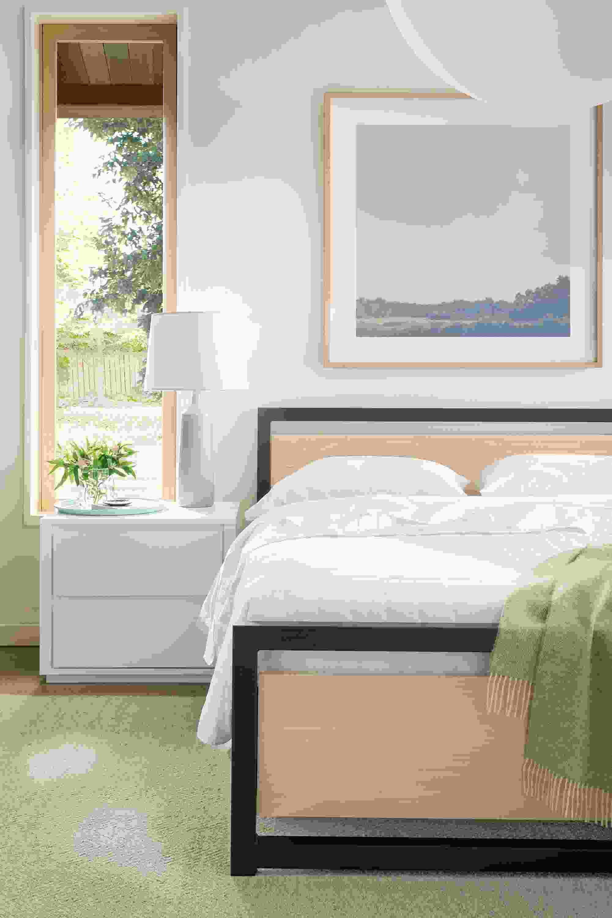 Bedroom with detail of Piper queen bed with salt on red oak panels and natural steel frame.