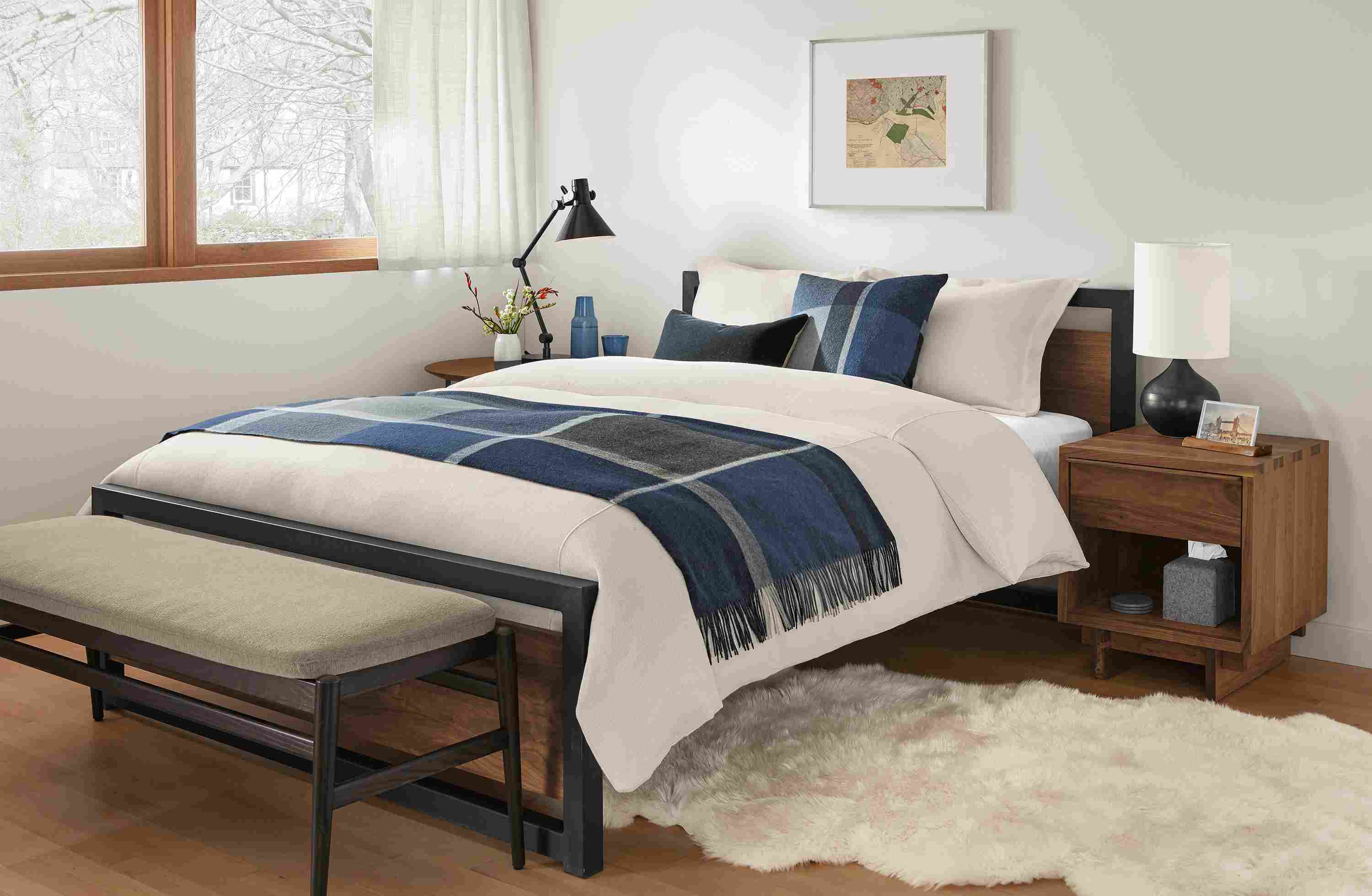 Bedroom with Piper Queen bed in walnut and natural steel and Evan bench in Myers Taupe.