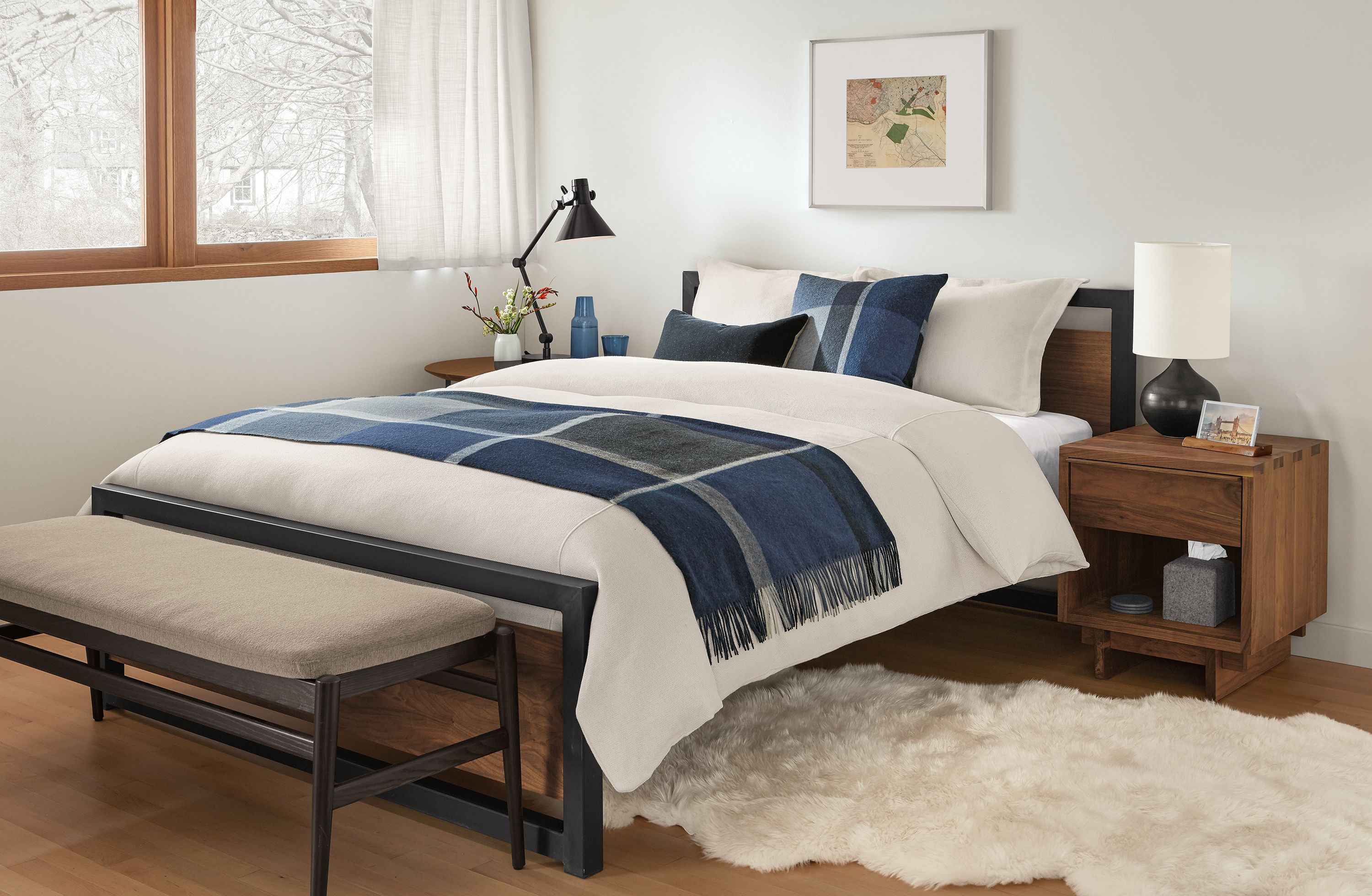 Bedroom with Piper Queen bed in walnut and natural steel and Evan bench in Myers Taupe.