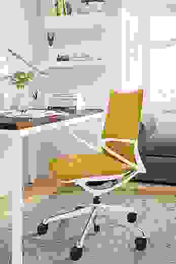 Detail of Plimode office chair in White with Saffron fabric in home office.