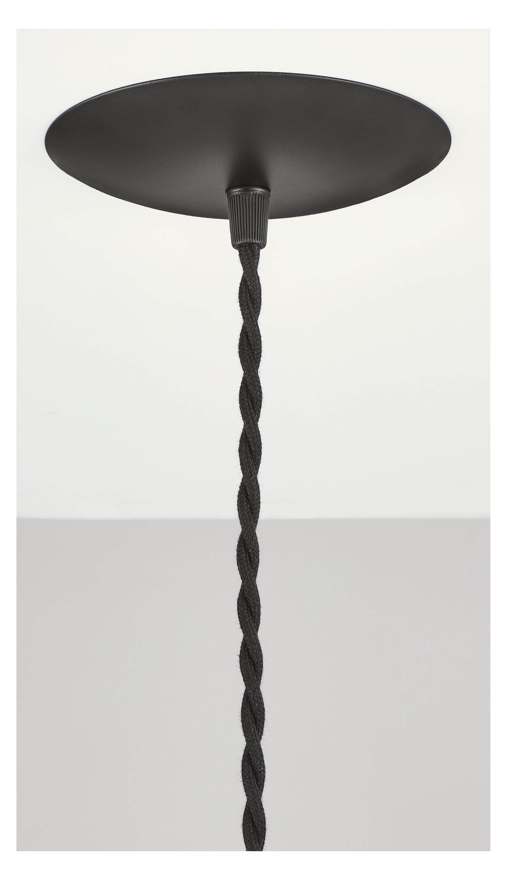 Detail of Polar pendant ceiling plate in black.