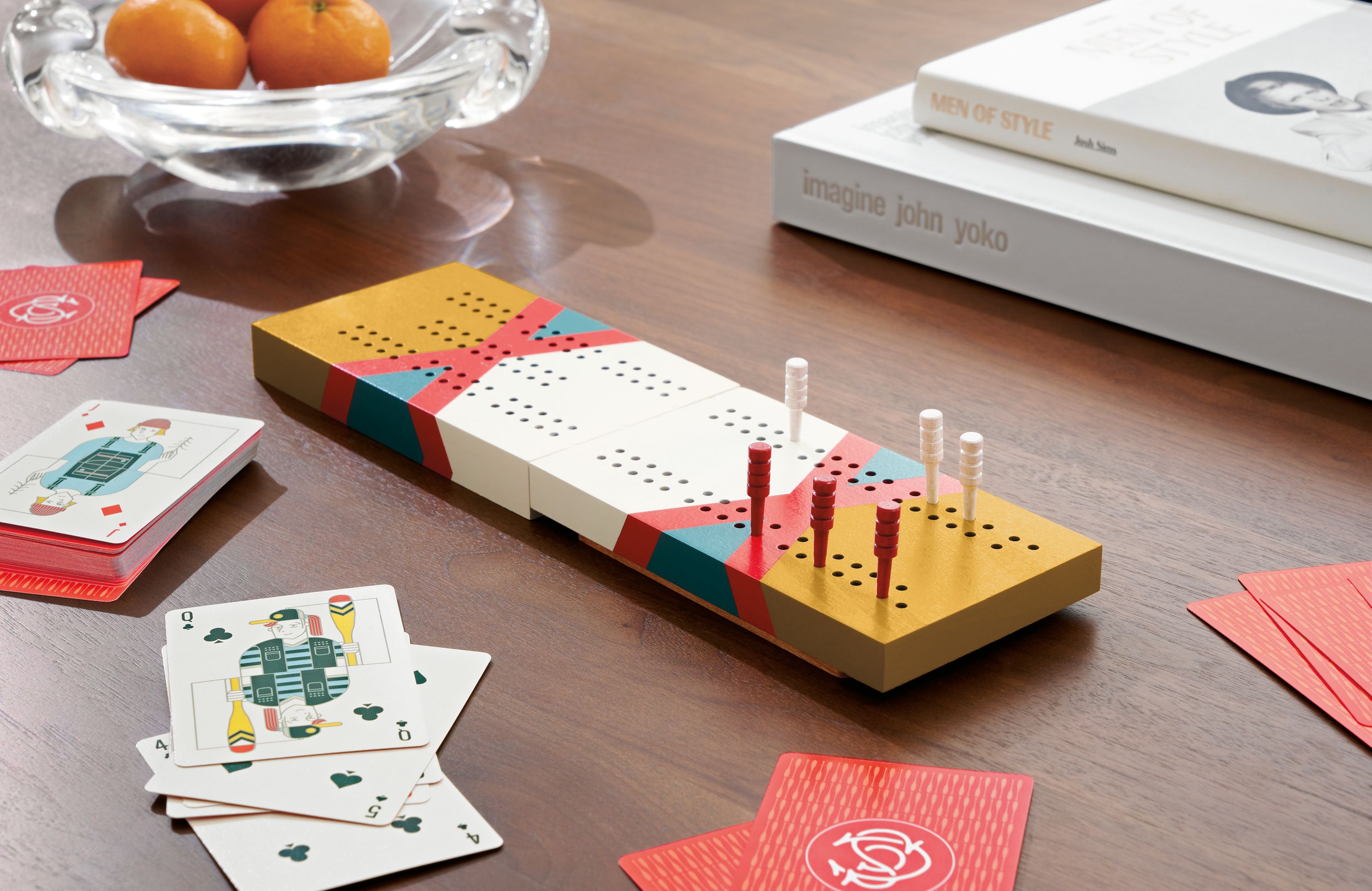 Portage travel cribbage board with Scout playing cards in mustard