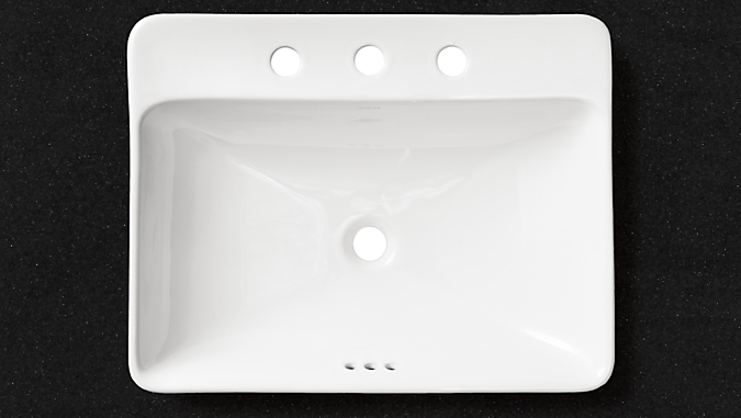 Detail of Kohler Vox Vessel Sink with Three Faucet Hole with Black Quartz Vanity top.