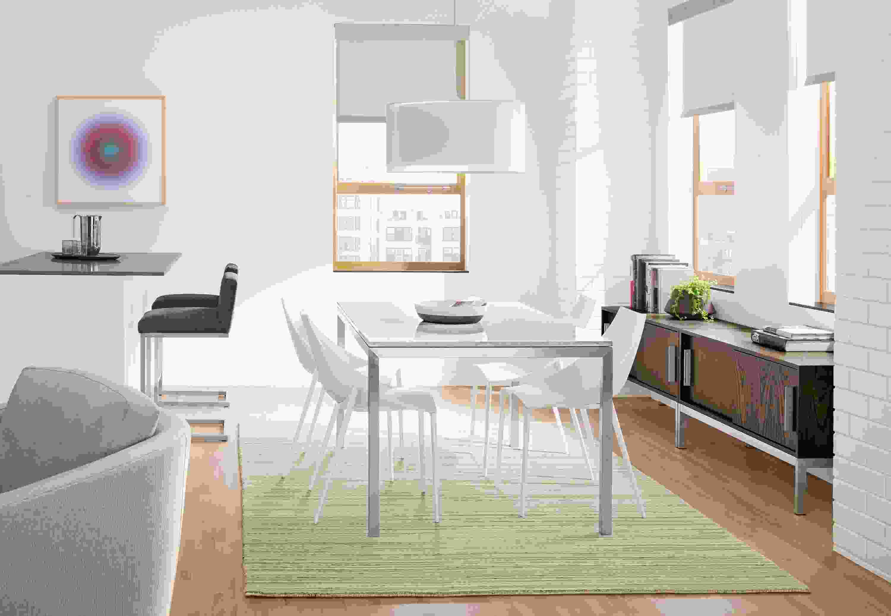 Parsons stainless steel dining table with marbled white top.