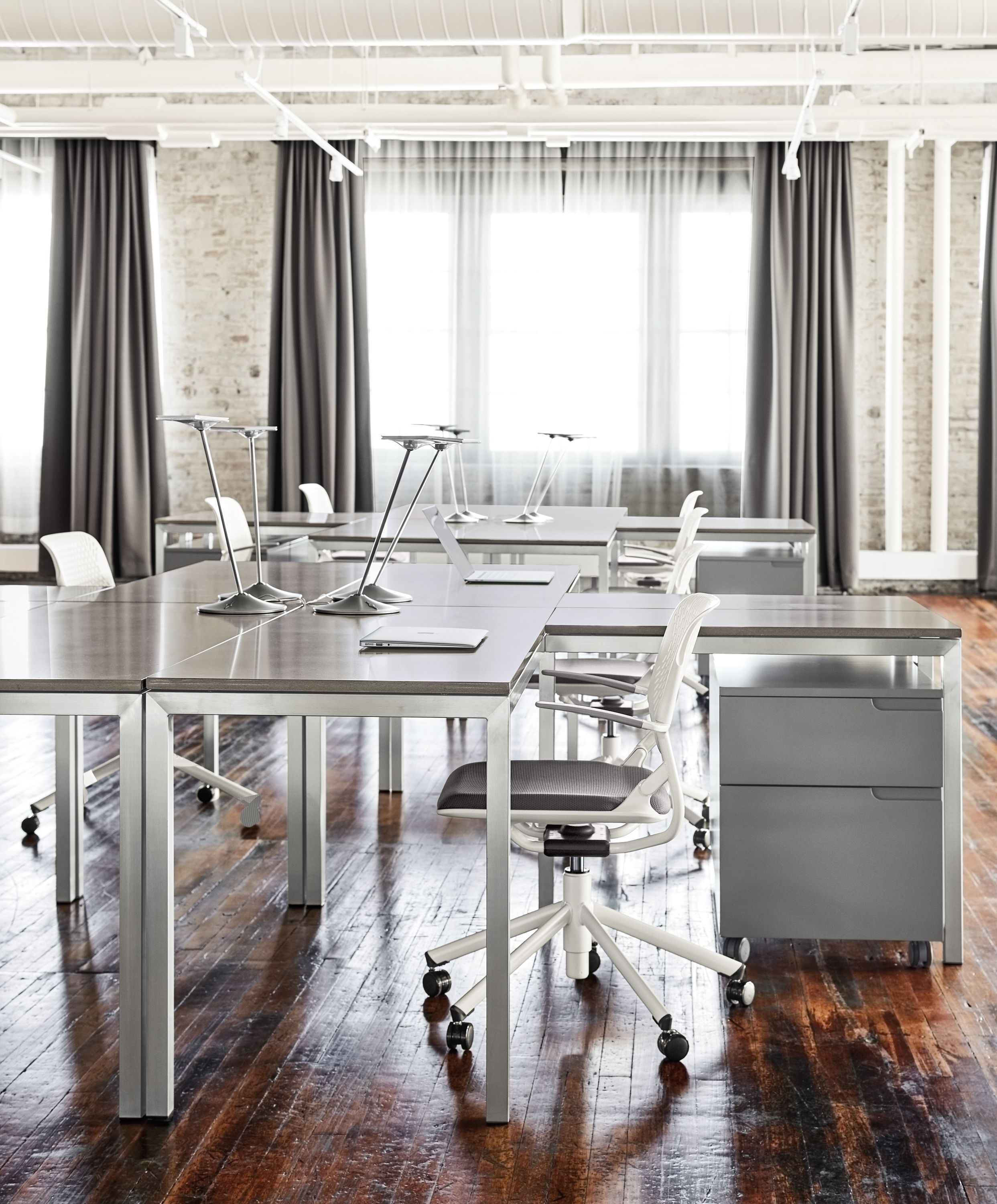 Detail of Parsons stainless steel l-shaped desk.